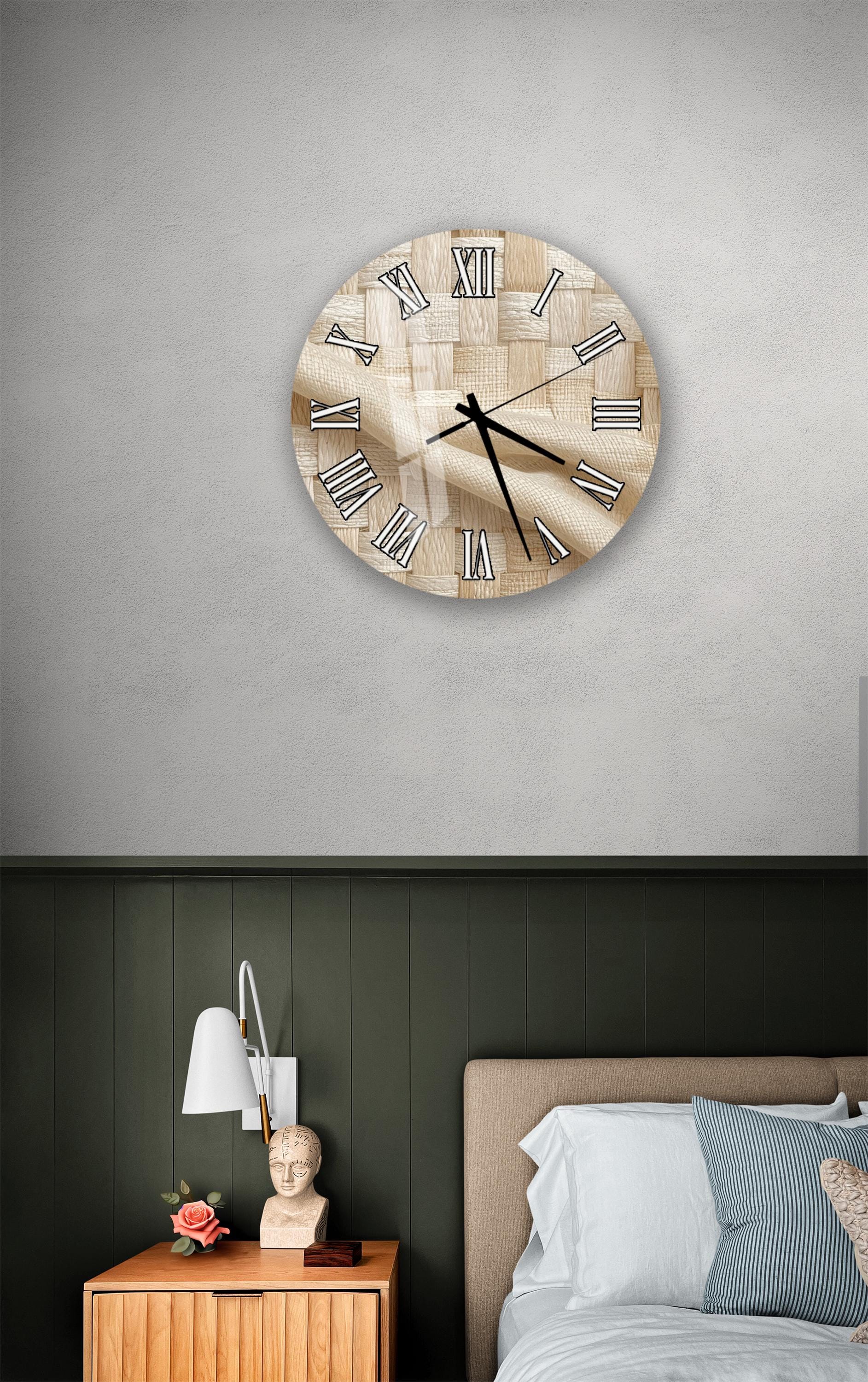 a bedroom setting with a wooden clock on the wall above a bed.