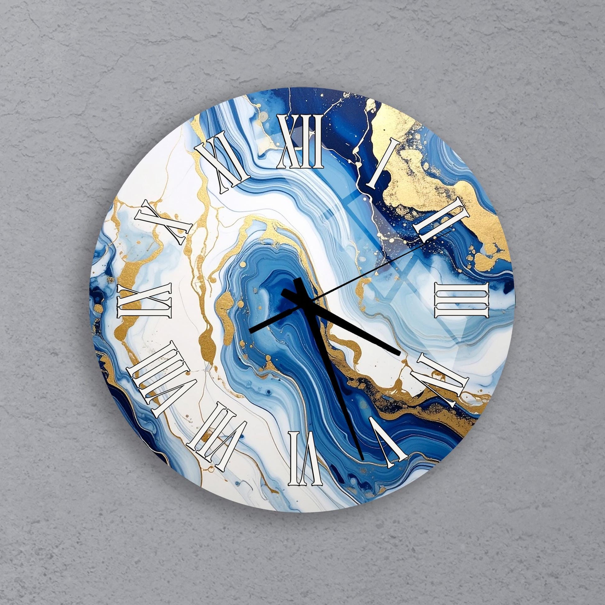 A round wall clock with a marble-style design featuring blue and white swirls and gold accents.