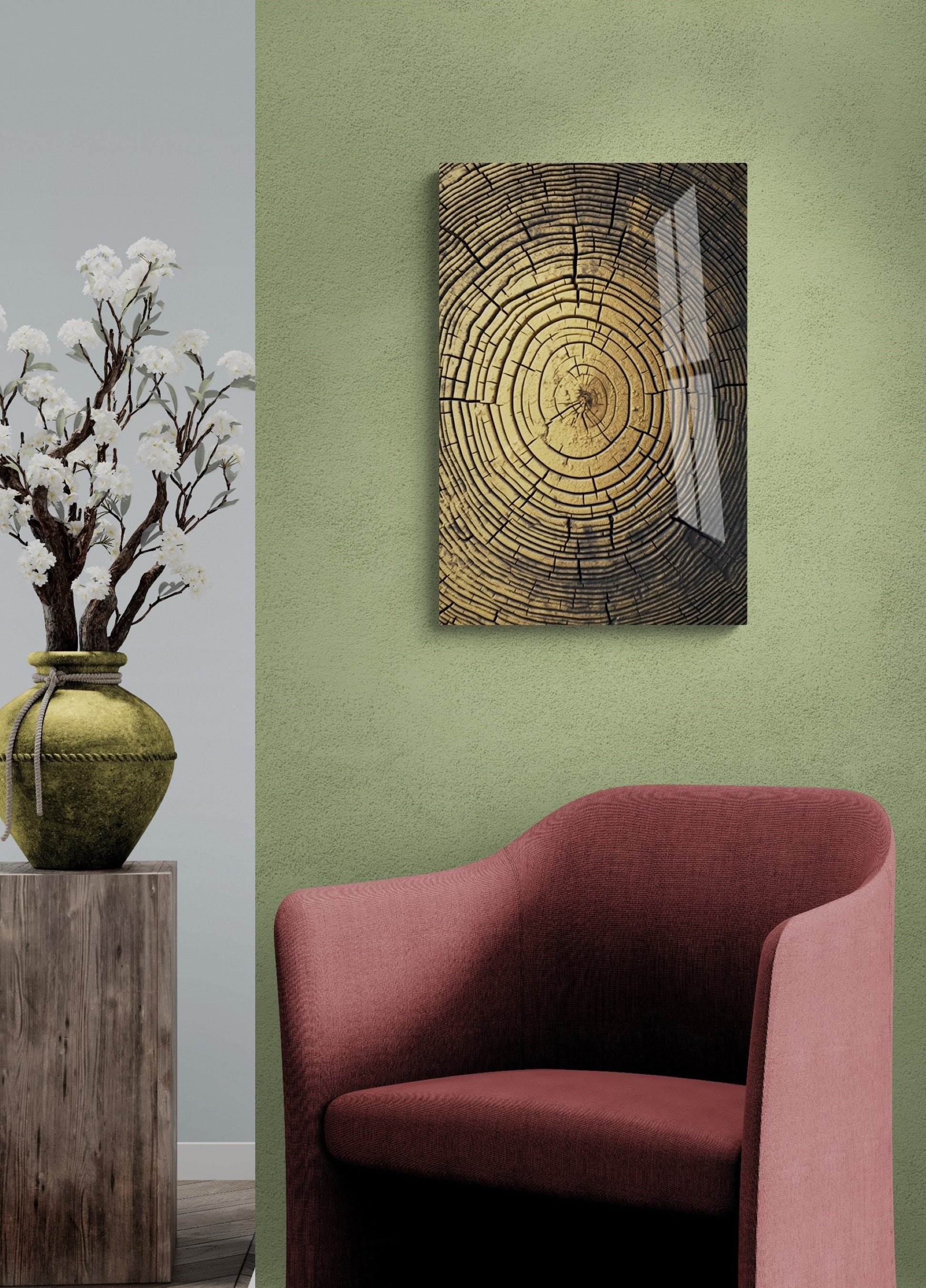a green room with a red chair and a painting on the wall