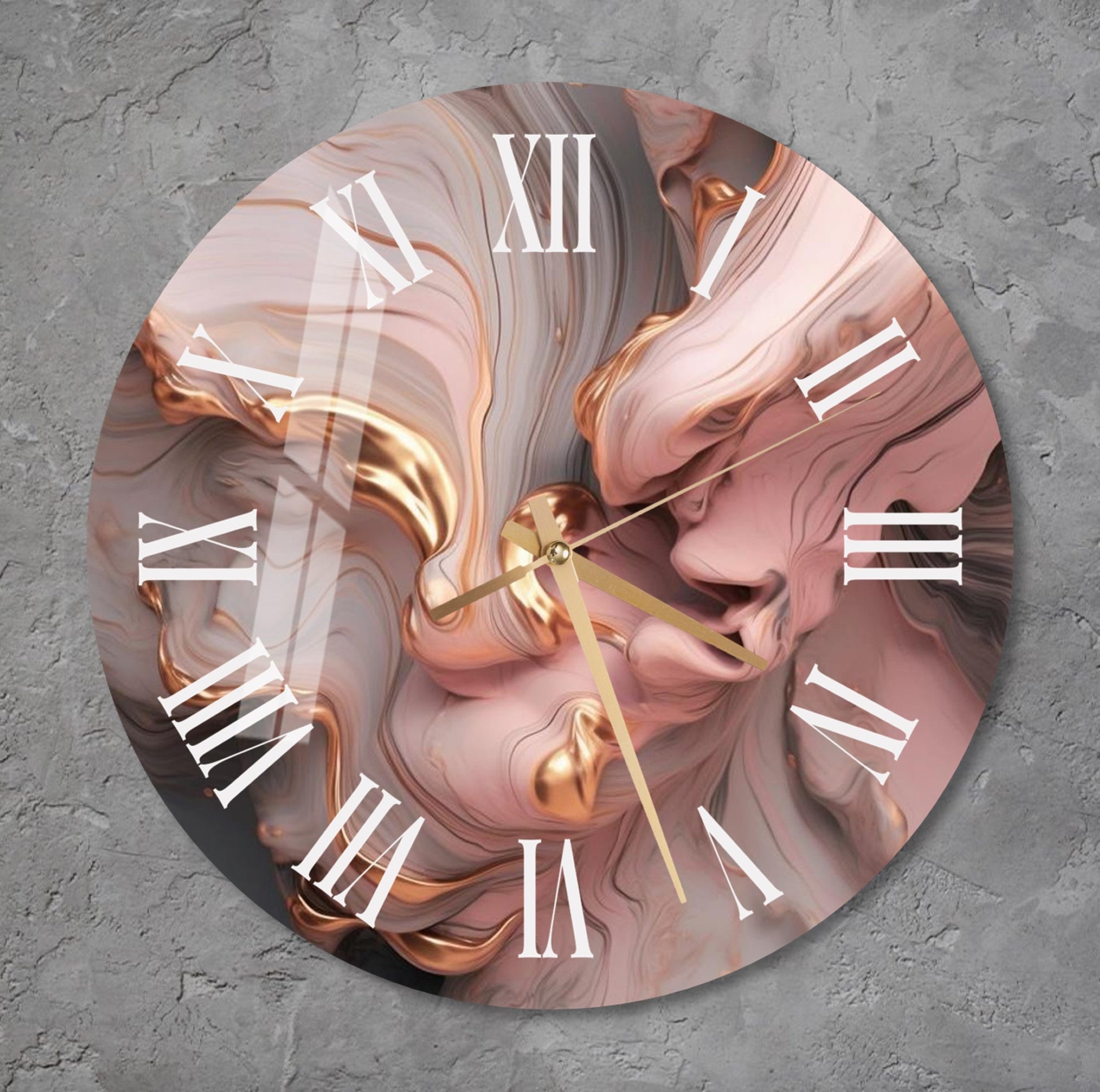 a clock with a pink and gold design on it
