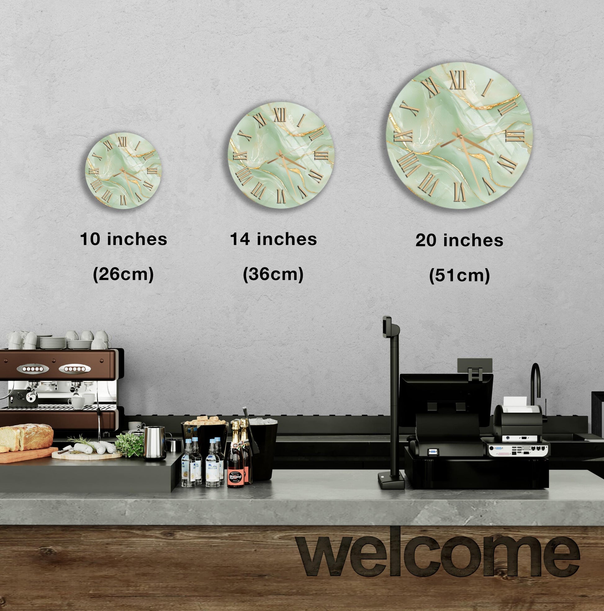 a counter with a cash register, a coffee machine, and a display of various items such as bottles and bread. There are three clocks hanging on the wall above the counter, each with a different size. The clocks are arranged in a row, with the largest clock being 20 inches and the smallest one being 10 inches. The image also includes text that reads "welcome" on the counter.