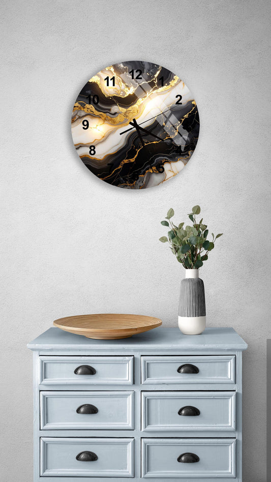 a wall clock with a marble-like design, mounted on a wall above a light blue dresser with six drawers. The dresser also has a vase with greenery and a wooden bowl on top.