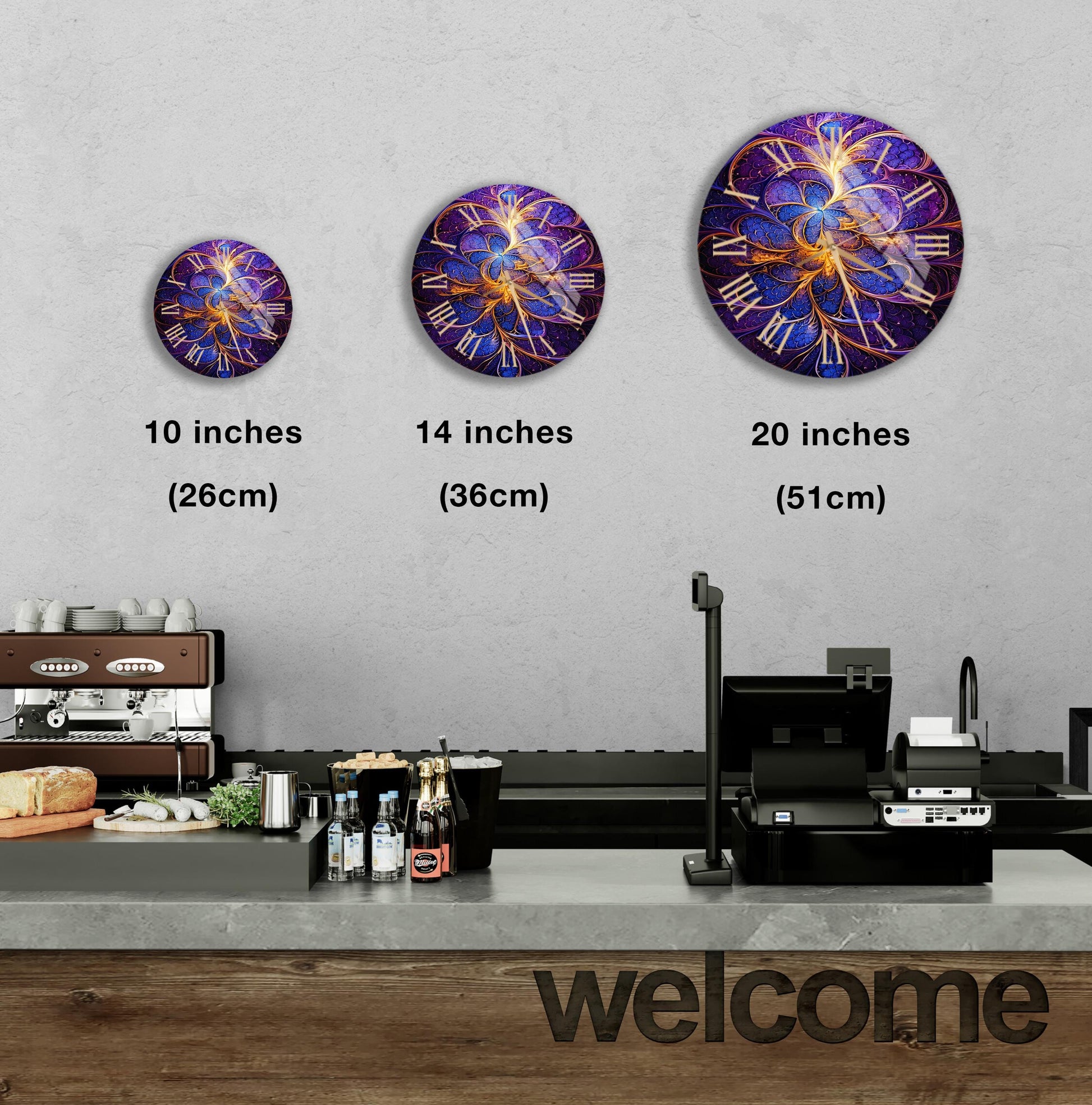 a kitchen counter with three clocks on the wall above it