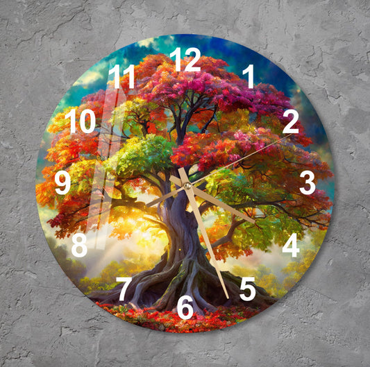 a clock with a painting of a tree on it