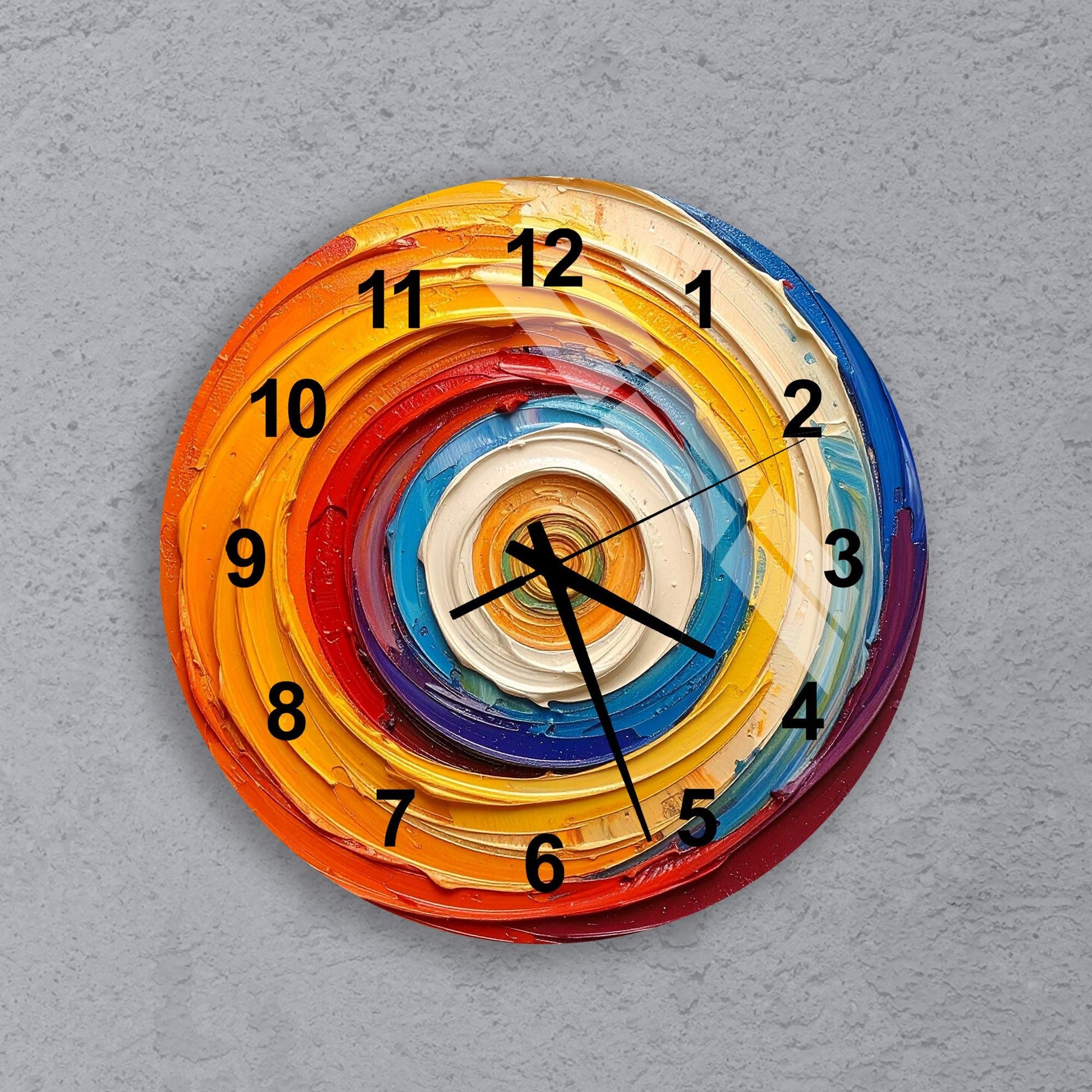 A colorful, abstract wall clock with a spiral design and black numbers on a gray background.