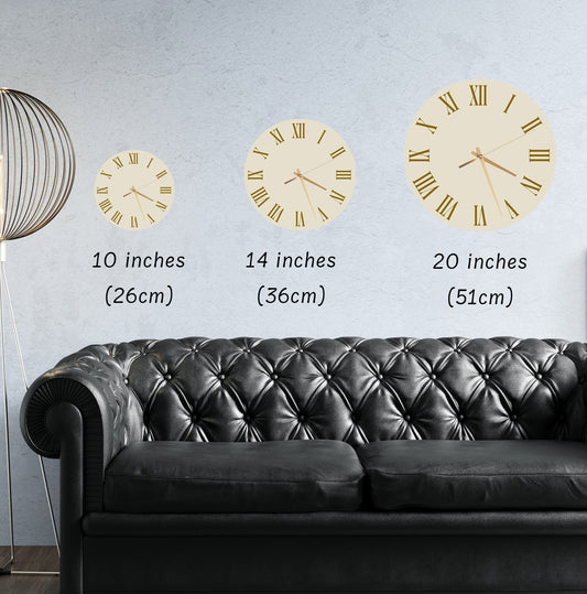 a clock on a wall with a black and gold design