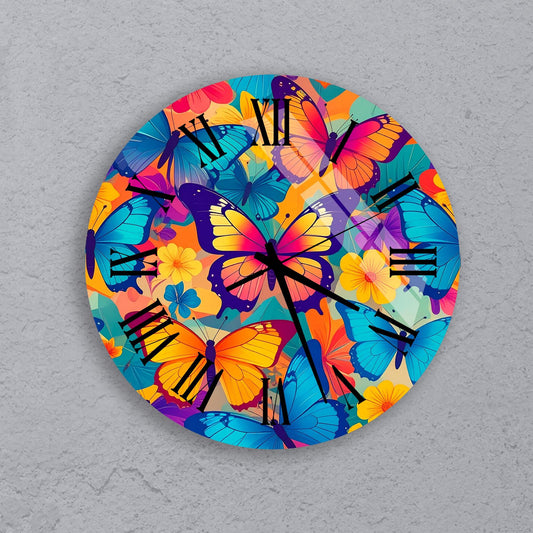 A round wall clock with a vibrant, colorful butterfly design on its face.