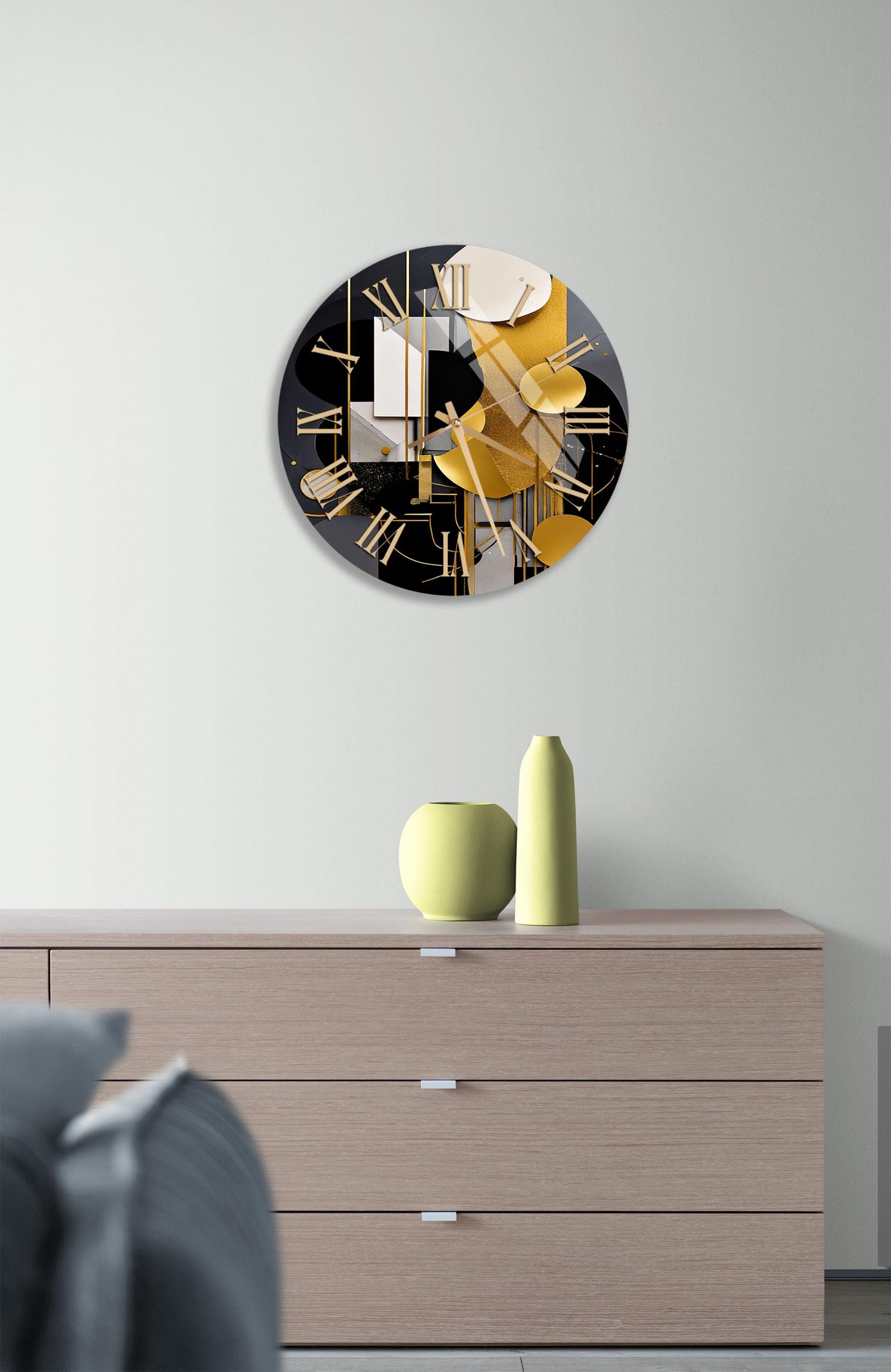 a clock that is on the wall above a dresser