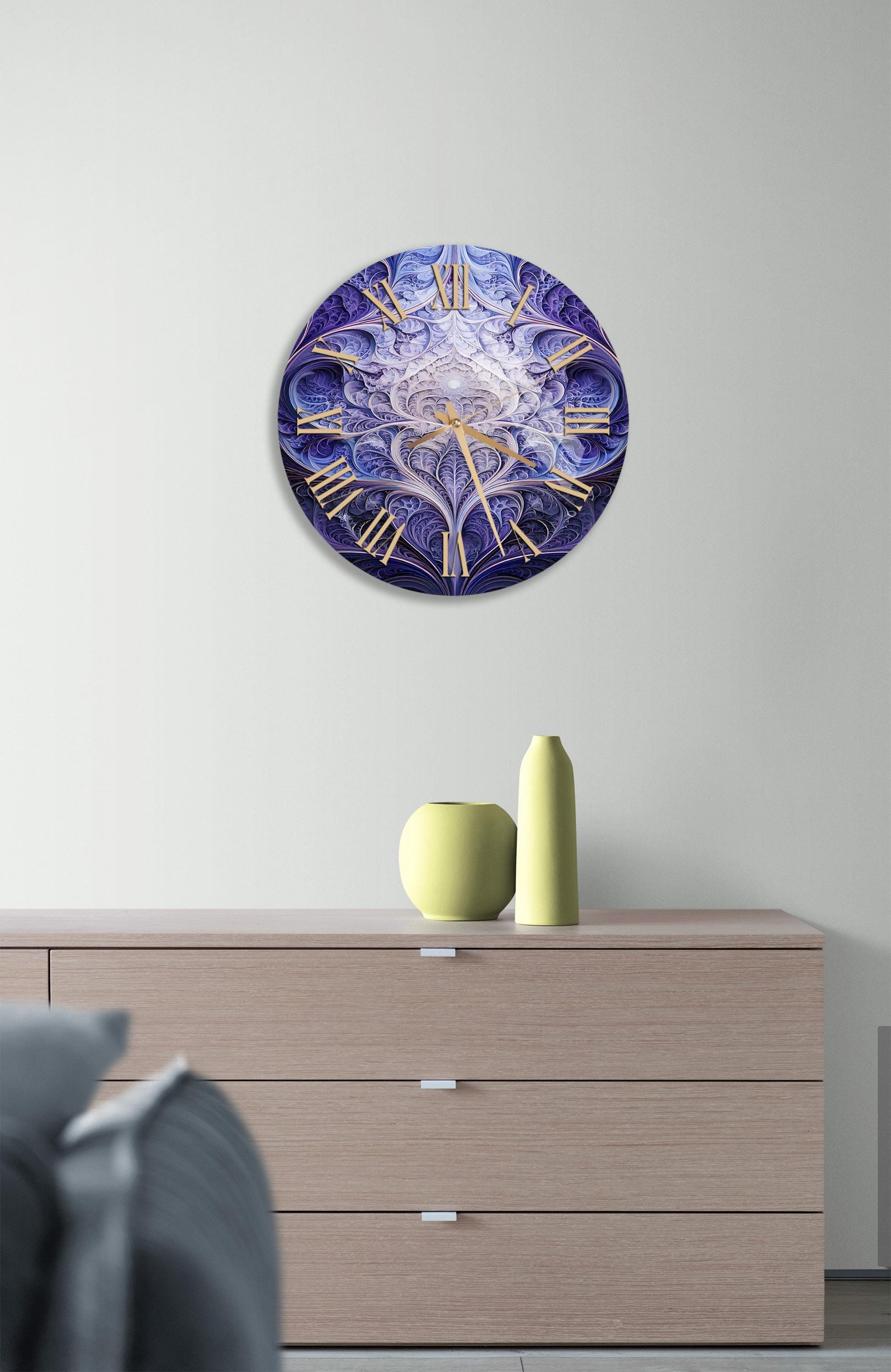 a clock on a wall above a dresser