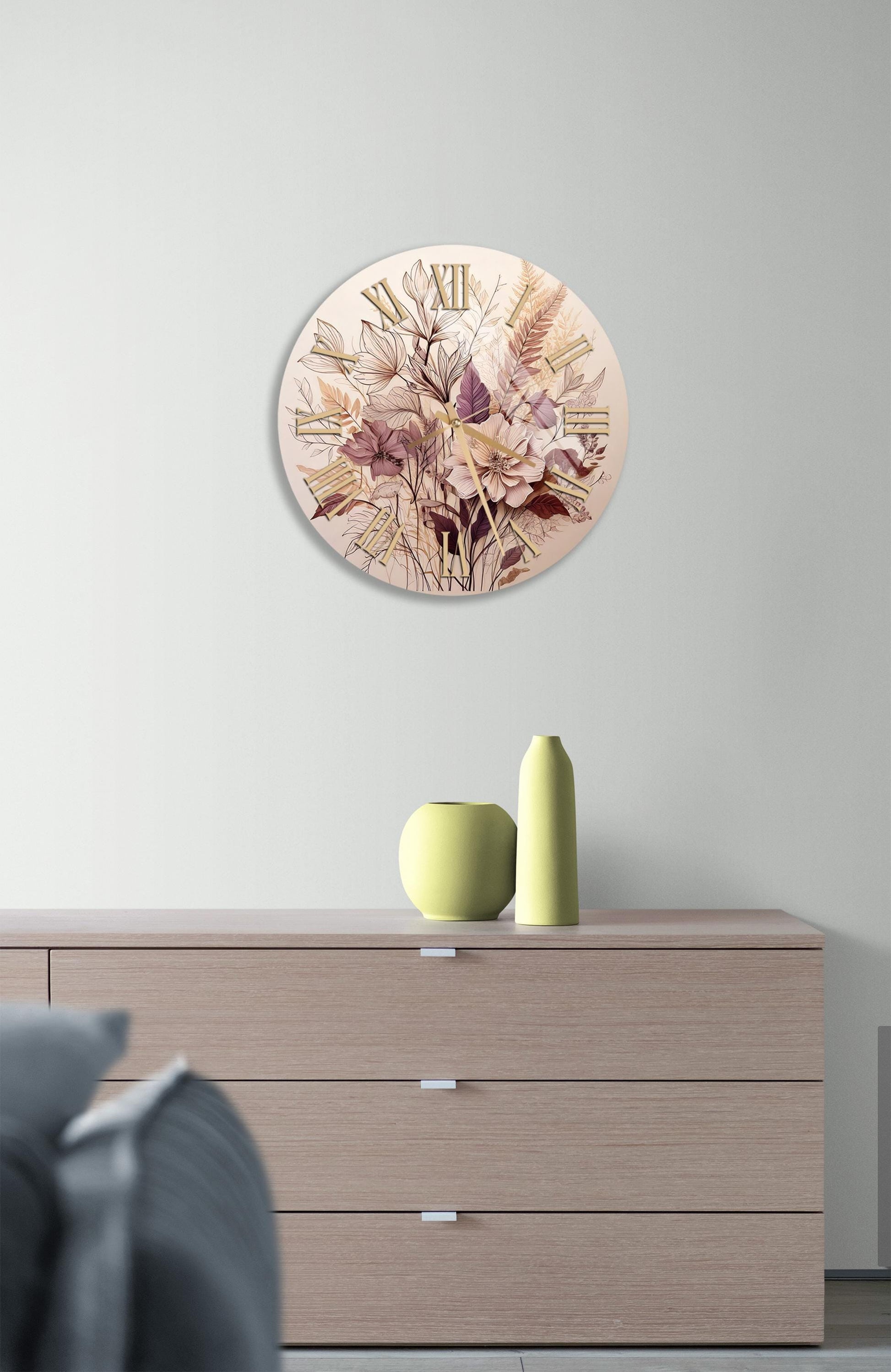 a clock on a wall above a dresser