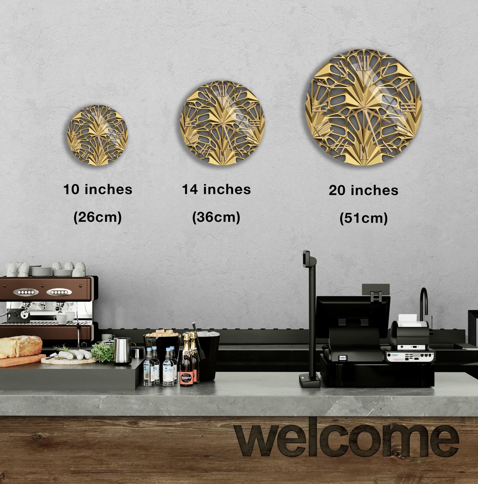 a counter in a restaurant with three different sizes of decorative plates displayed above it. The plates are gold in color and feature a floral design. The counter also has various items such as bottles and a cash register. The word "welcome" is written on the counter, indicating the welcoming atmosphere of the restaurant.