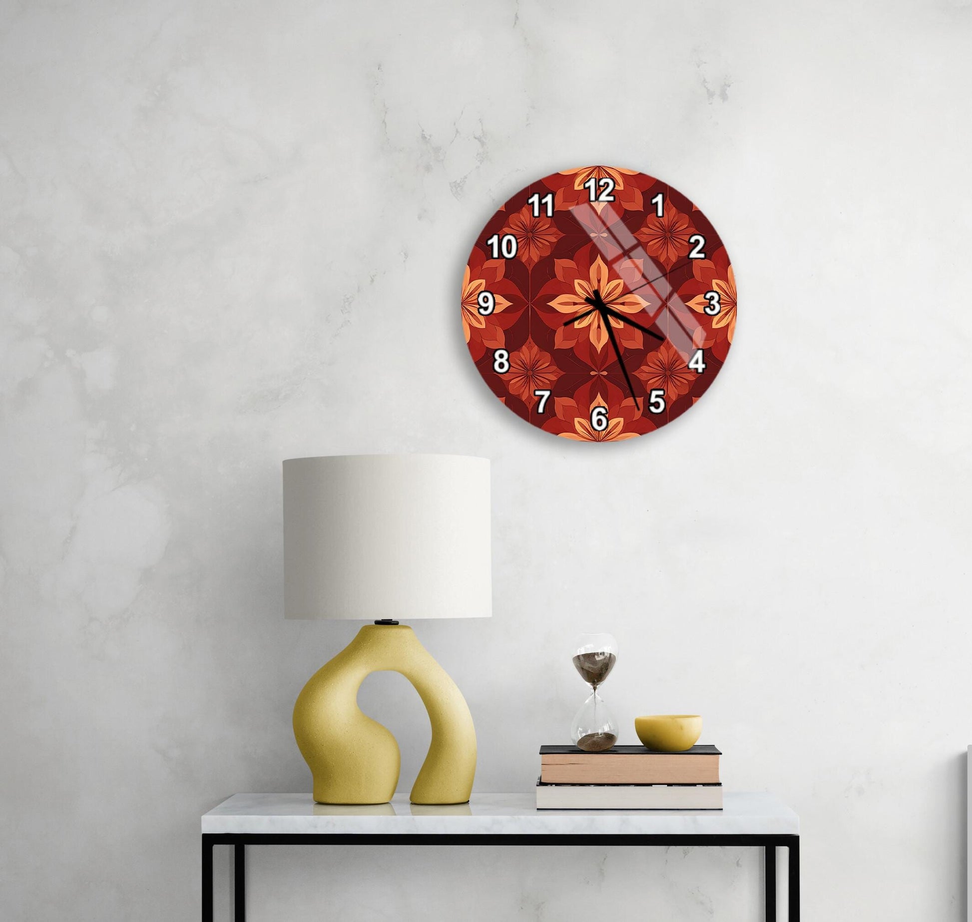 a white wall with a round clock displaying the time, a yellow lamp on a table, and a stack of books.