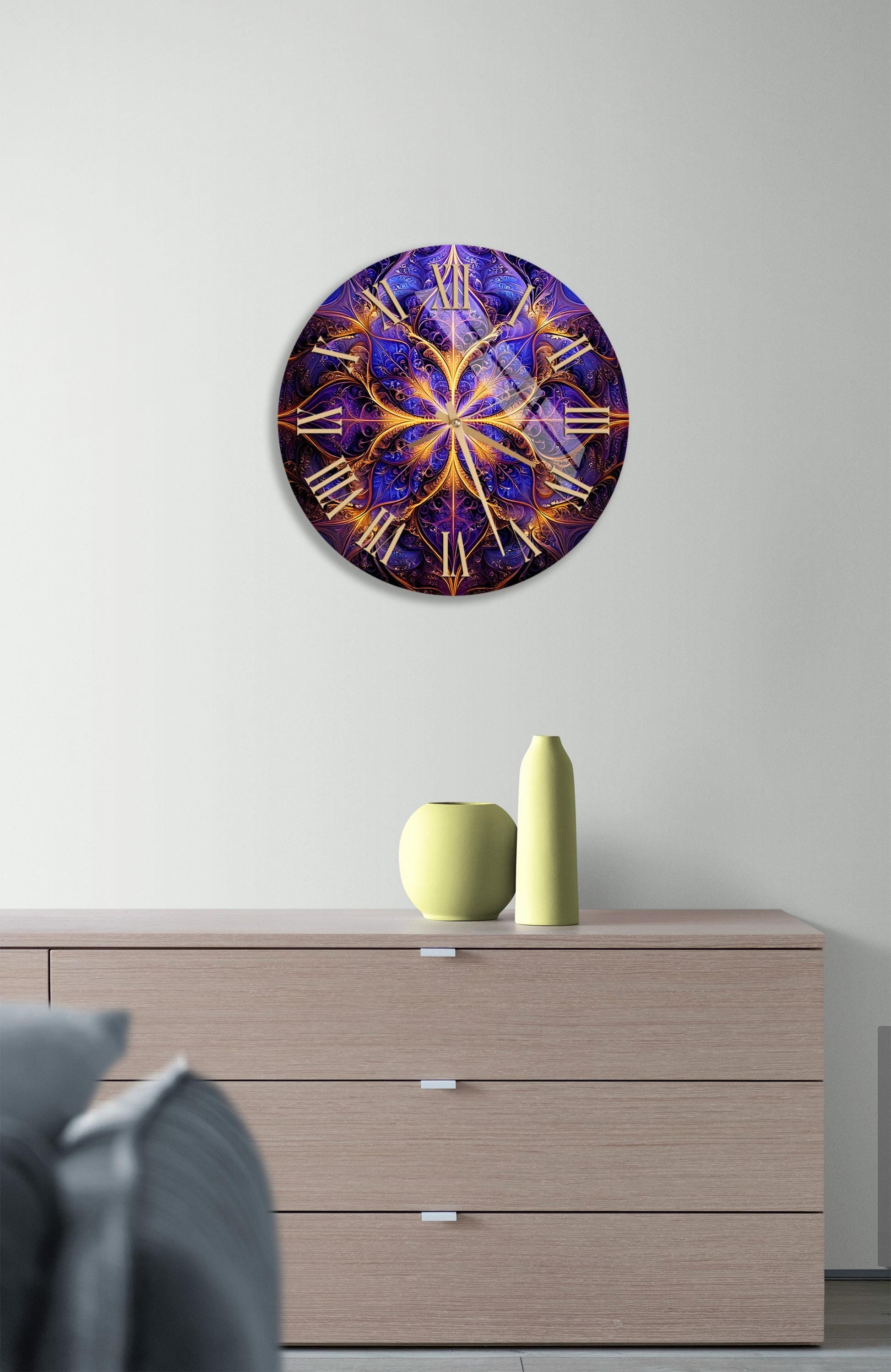 a clock on a wall above a dresser