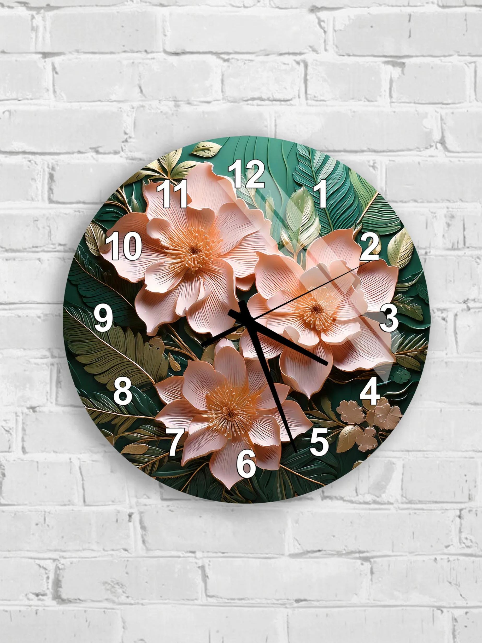 A round wall clock with a floral design featuring pink flowers and green leaves.