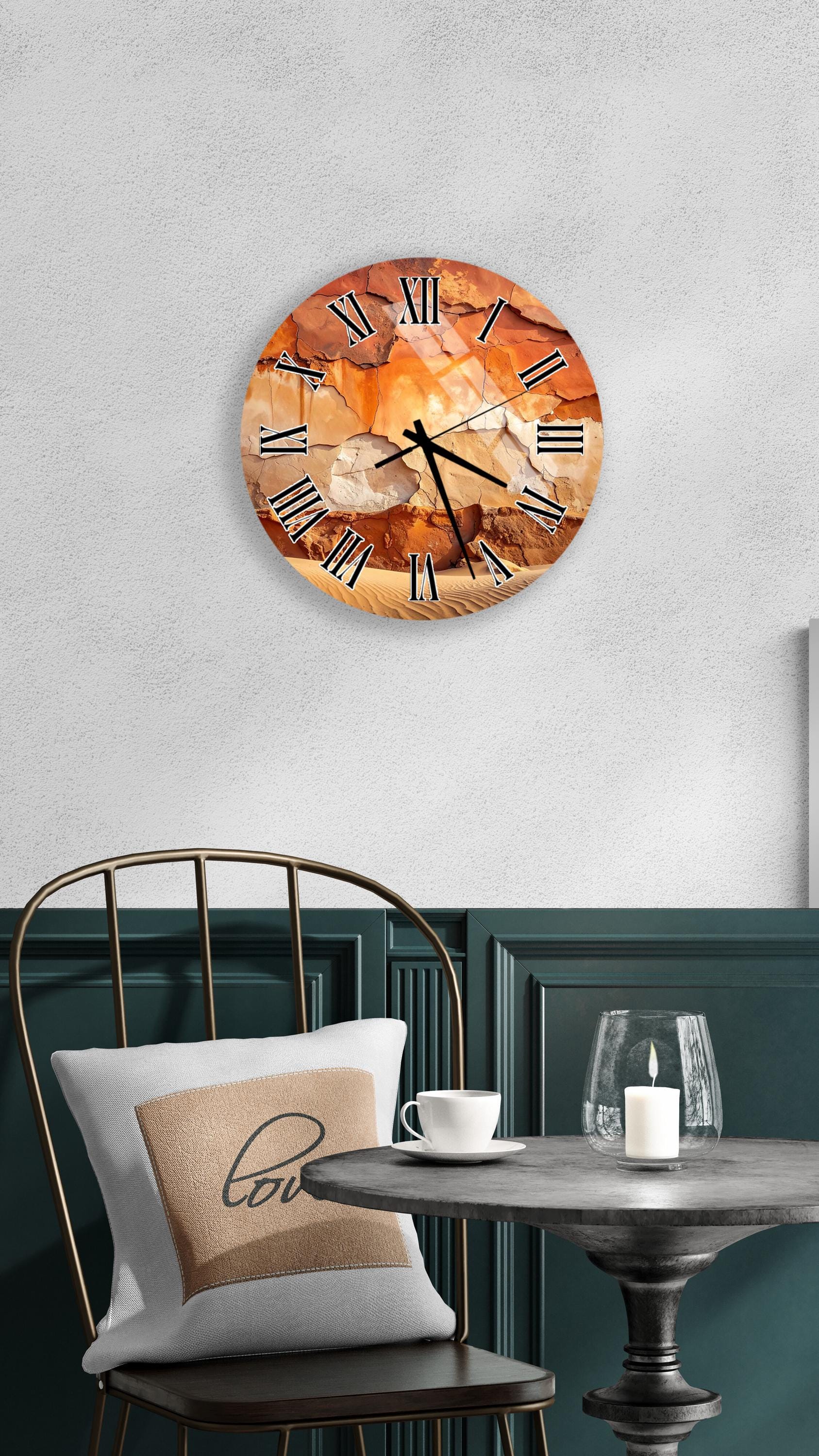 a round wall clock with a unique orange and brown stone design, mounted on a white wall above a dining table with a white tablecloth.