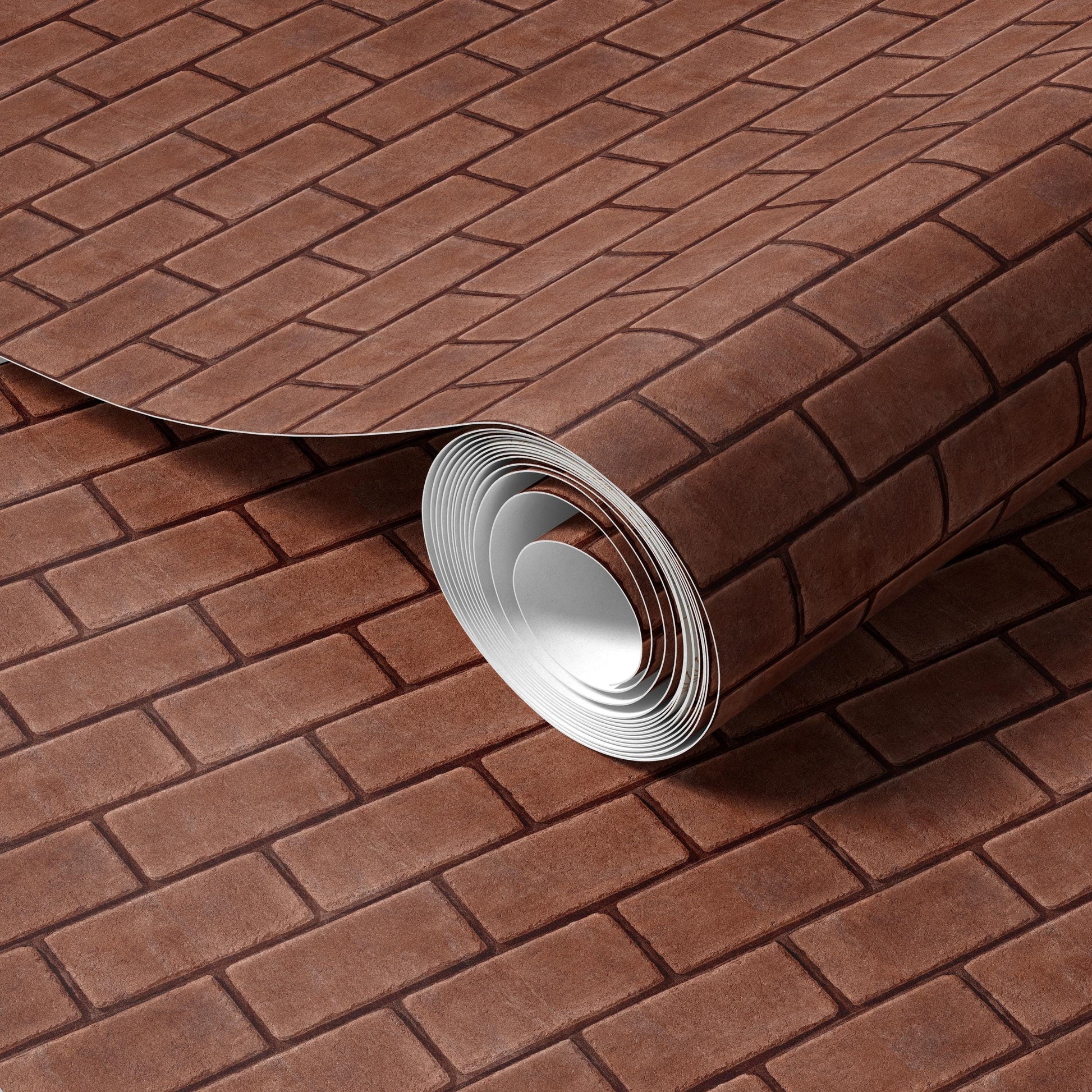 A roll of brown brick-patterned wallpaper is shown, with the roll partially unrolled and revealing a brick pattern.