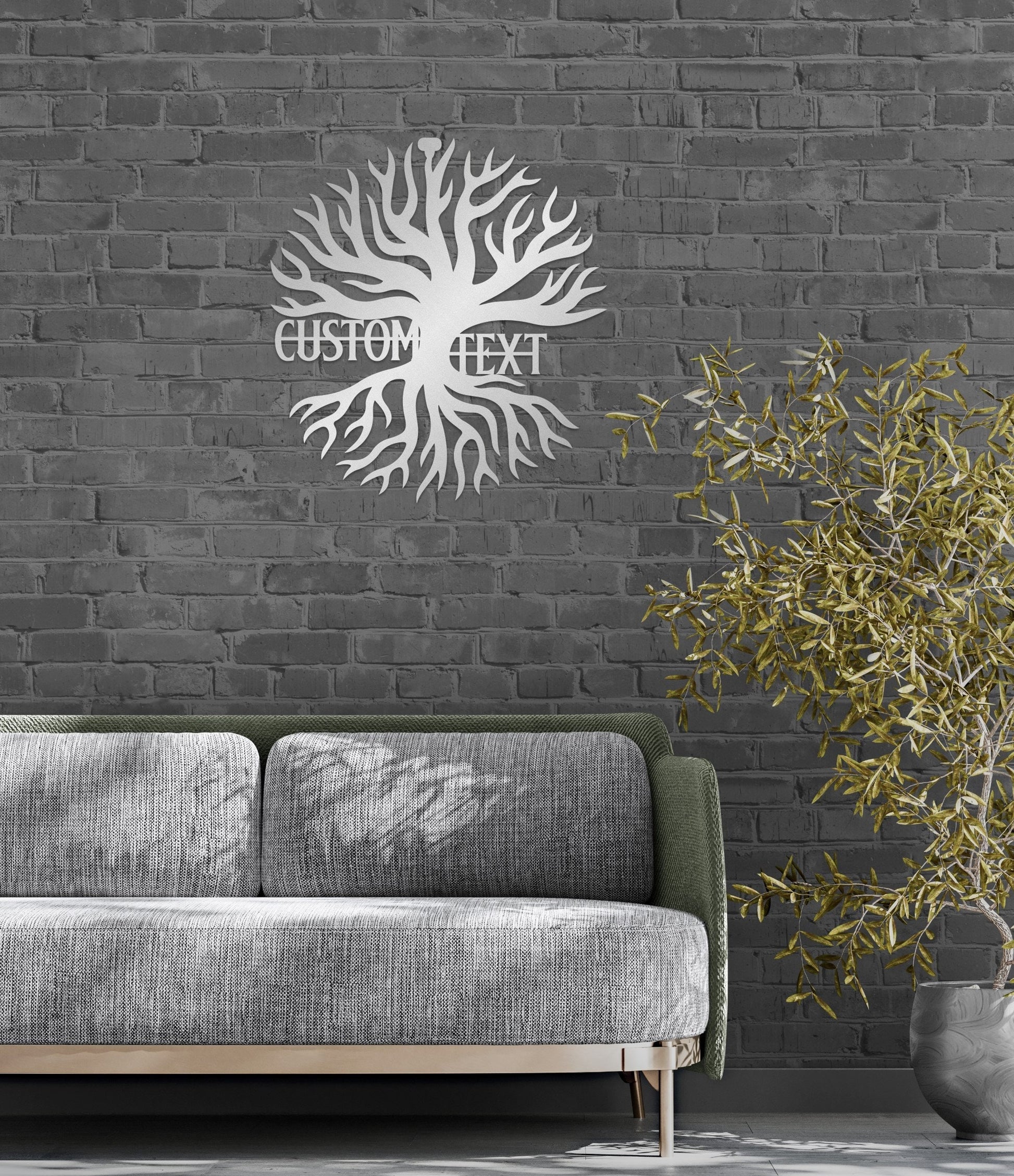 a couch sitting in front of a brick wall