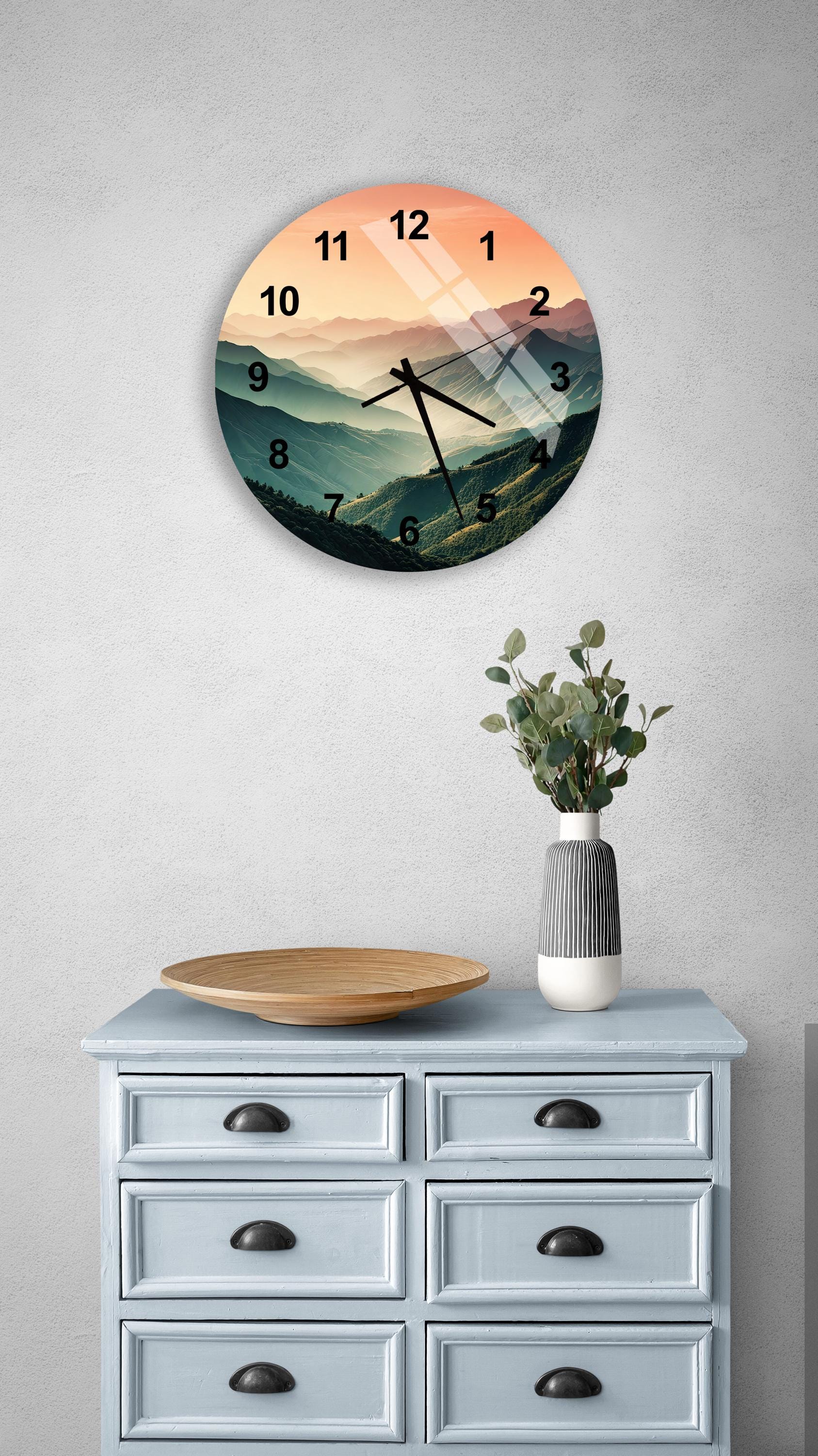 a clock on a wall above a dresser