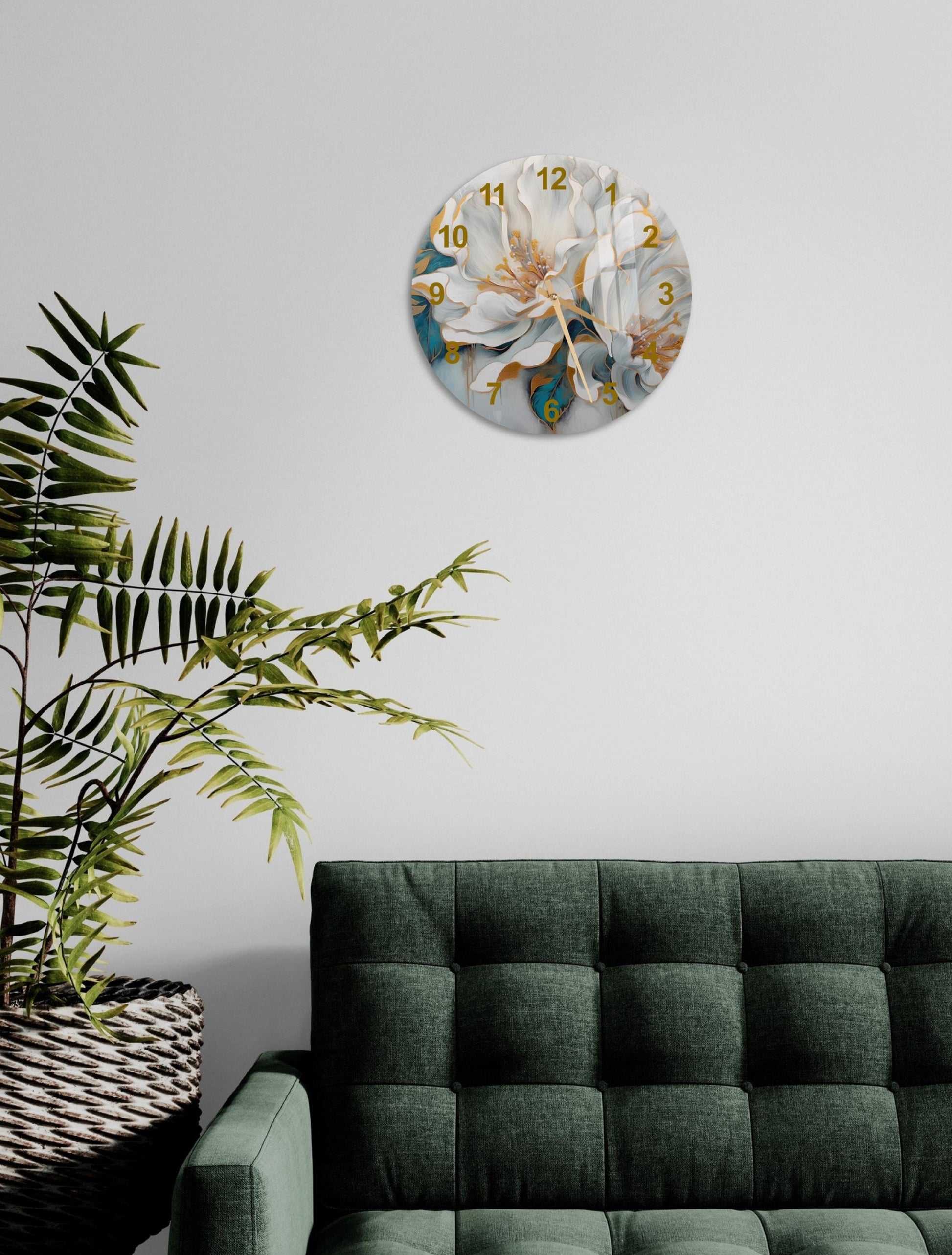 a living room with a green couch and a clock on the wall