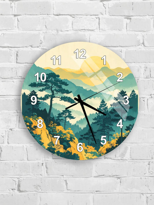 A wall clock with a landscape scene featuring mountains, trees, and a sunlit sky.
