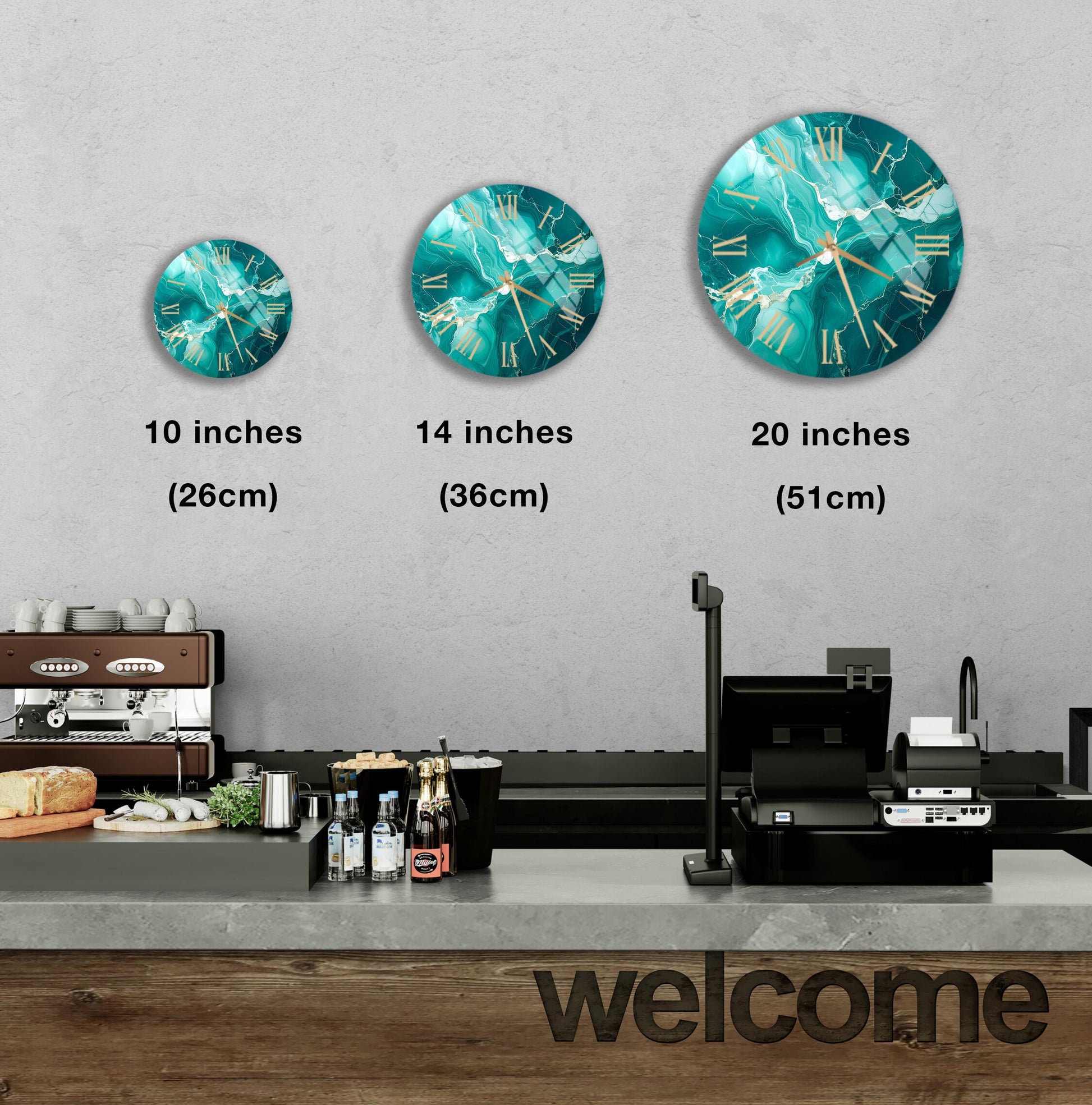 a wall with three clock designs of different sizes, ranging from 10 inches to 20 inches in diameter. Below the clocks, there is a counter with various items such as bottles and a cash register. The word "welcome" is also visible in the image.