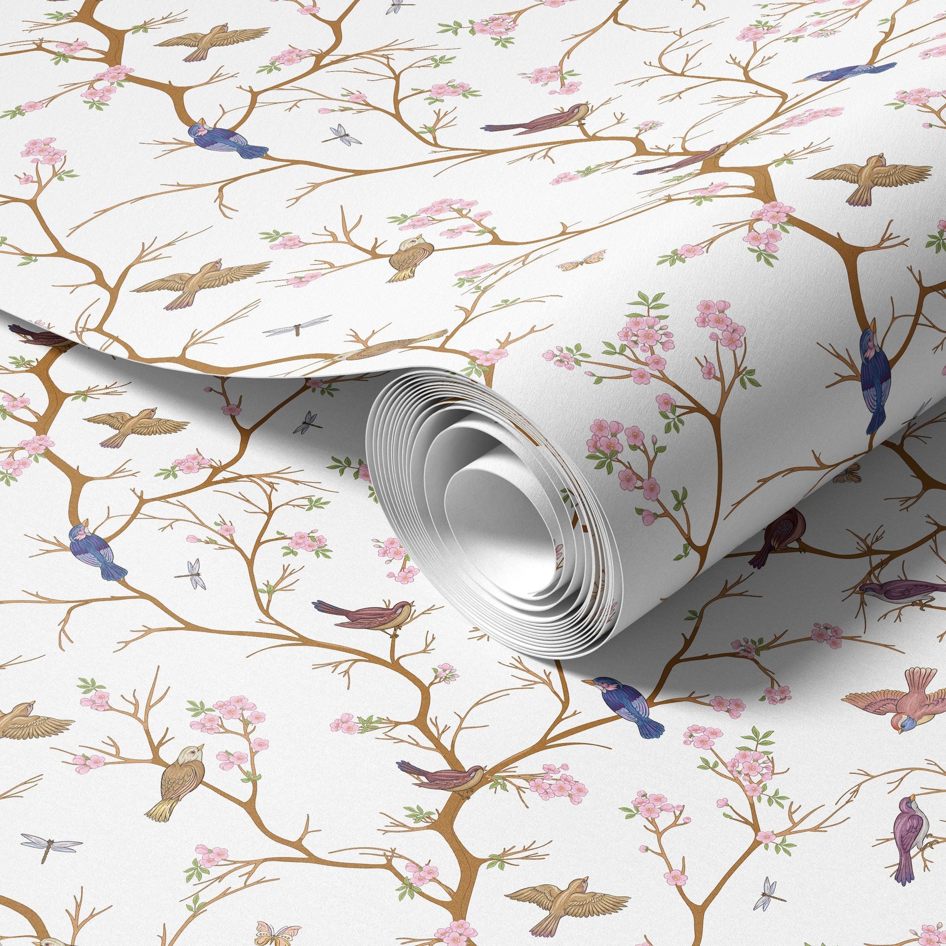a roll of wallpaper with a repeating pattern of birds perched on branches and flowers.