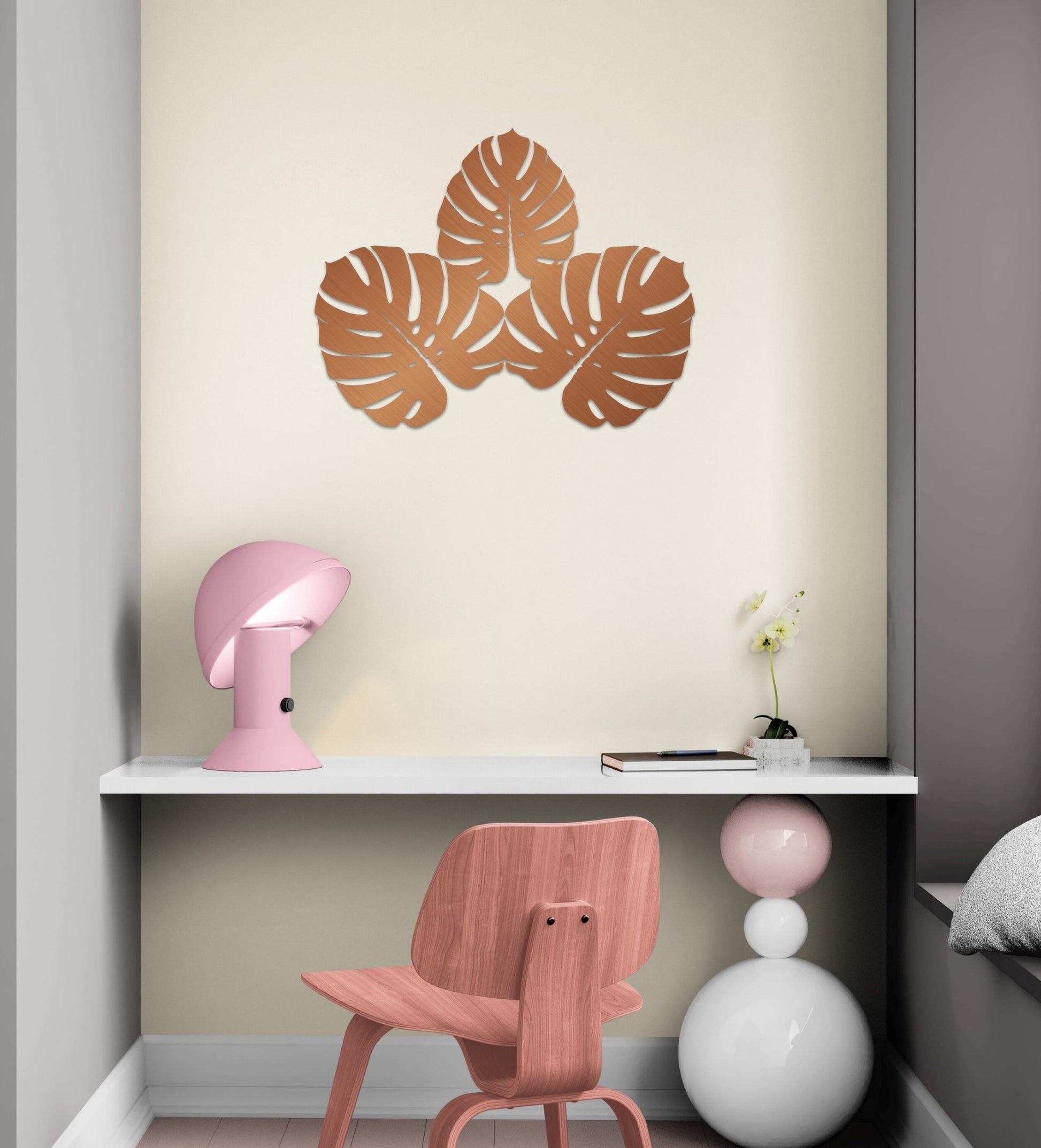 a pink chair sitting in front of a white shelf