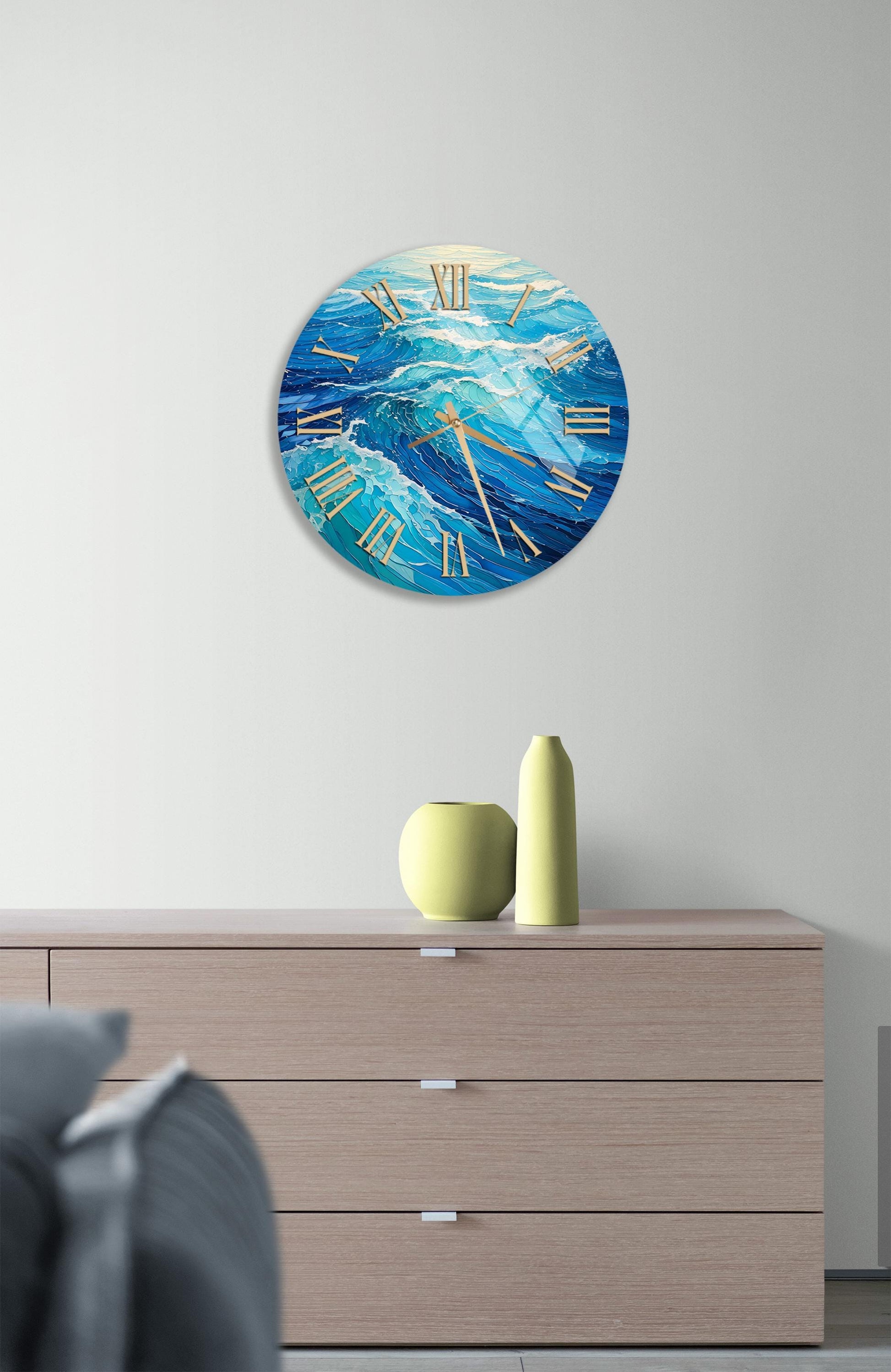 a clock on a wall above a dresser