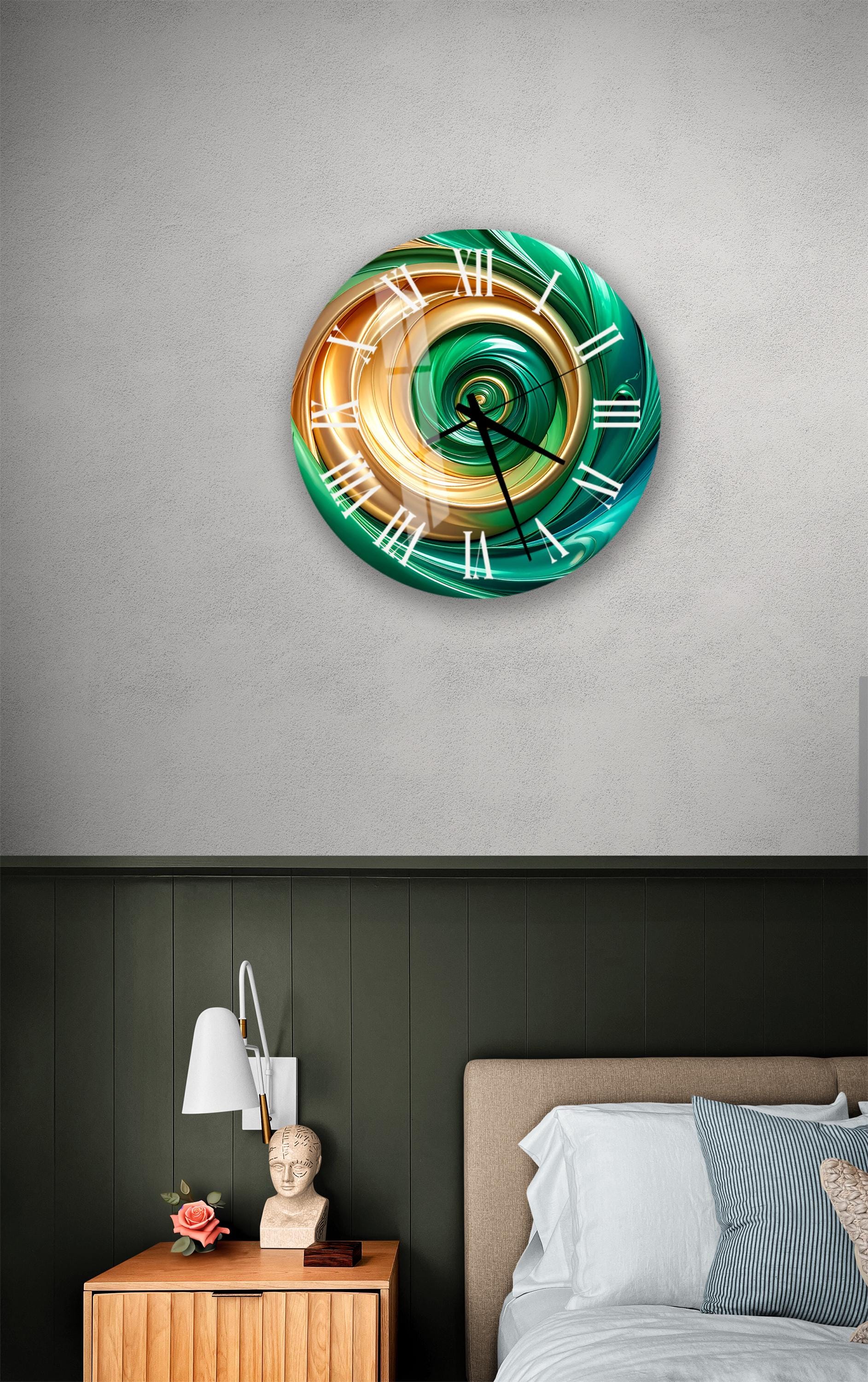 a modern bedroom with a large, colorful clock on the wall above a bed. The clock has a spiral design and is green, orange, and gold in color. The bed is covered with white sheets and has a wooden headboard. There is also a nightstand with a lamp and a small sculpture on it.