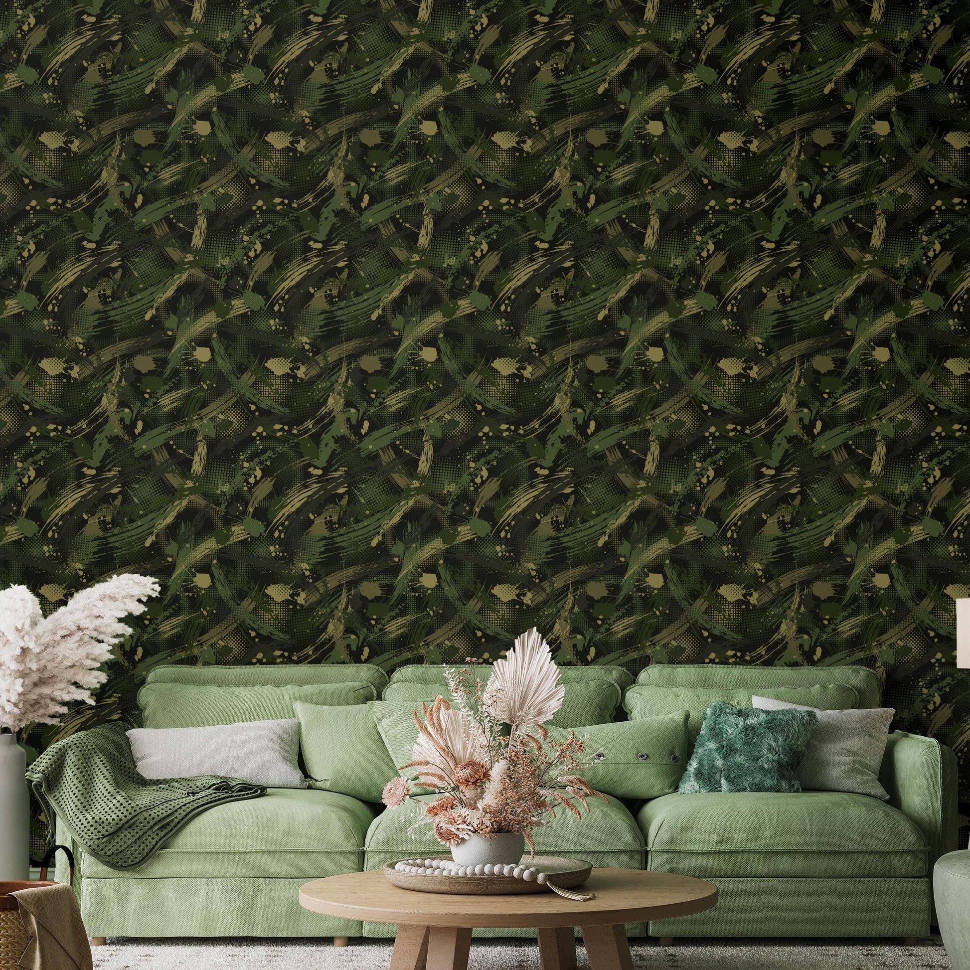 a living room with a green sofa, a wooden coffee table, and a vase of flowers. The walls are covered in a green wallpaper with a leafy pattern, creating a lush and vibrant atmosphere.