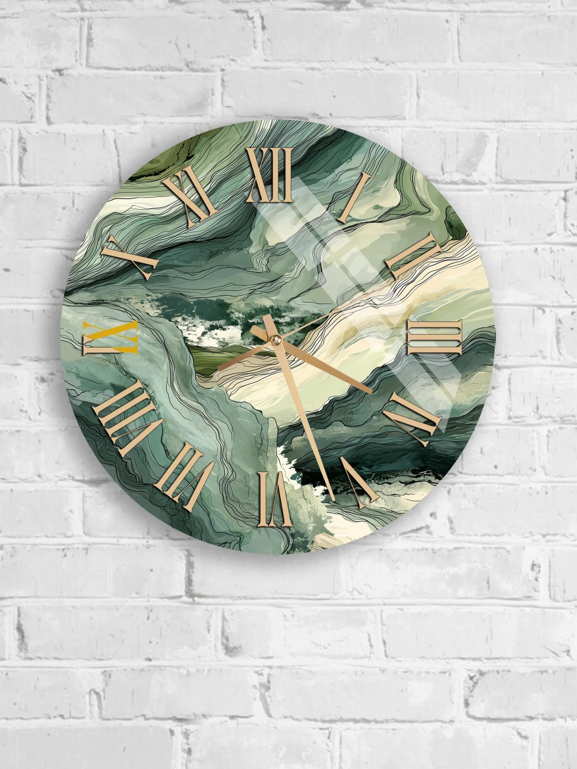 A round wall clock with a marble-like green and white abstract design, mounted on a white brick wall.