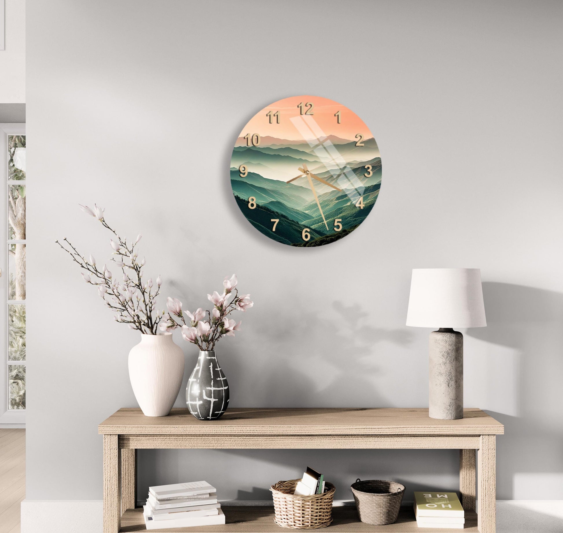 a clock on a wall above a table with a vase of flowers