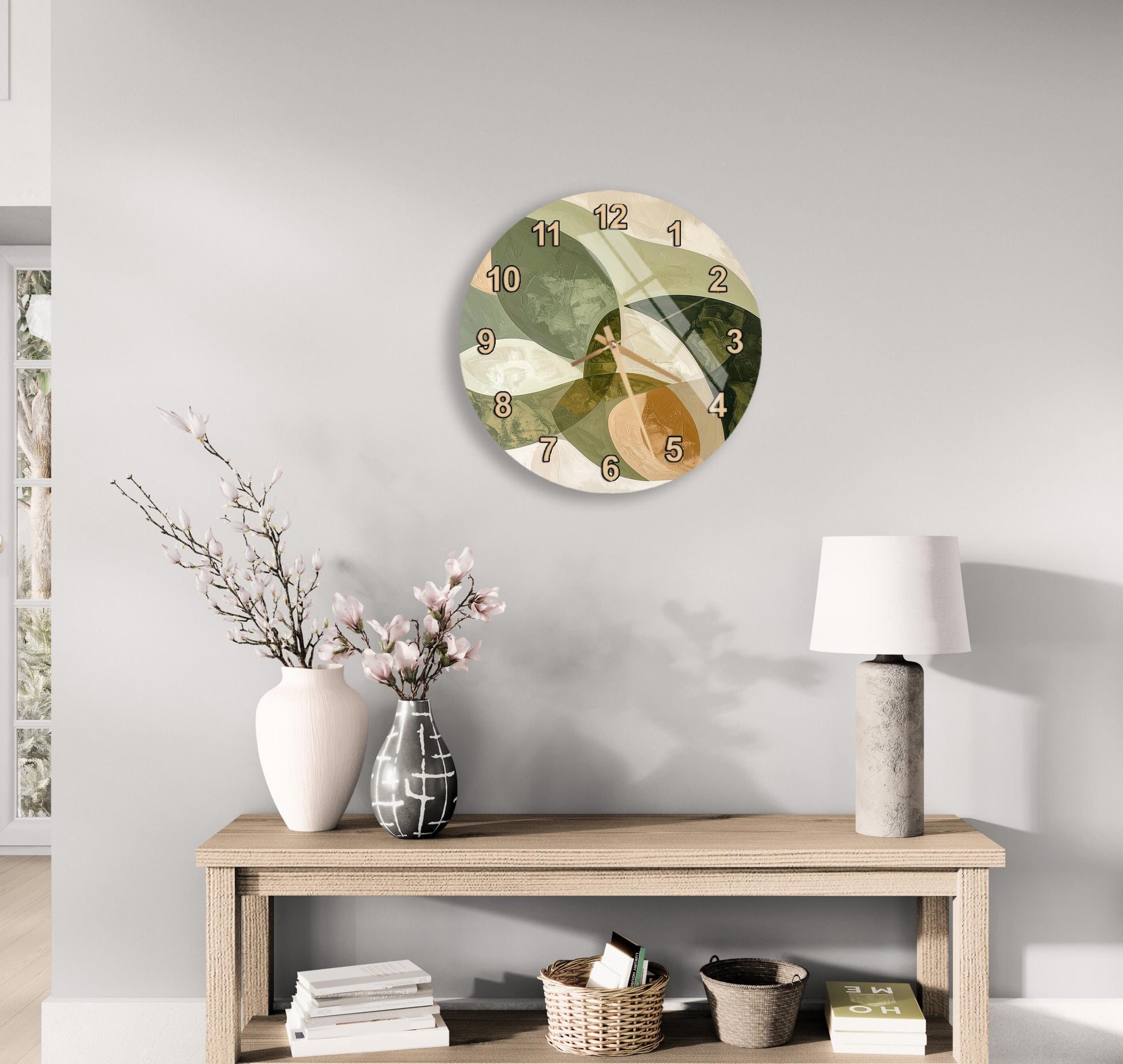 a modern living room with a wooden console table, a round wall clock with a unique abstract design, a lamp, a vase with flowers, and some books.