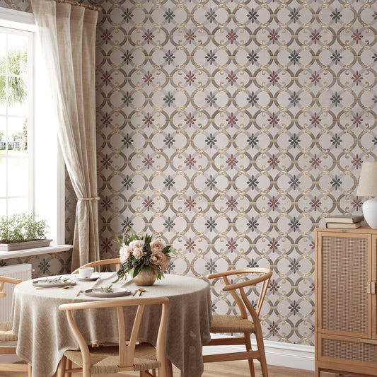 a cozy dining room with a round wooden table set for two, featuring a vase of flowers as the centerpiece. The walls are adorned with a patterned wallpaper, and a window with curtains can be seen on the left side of the room.