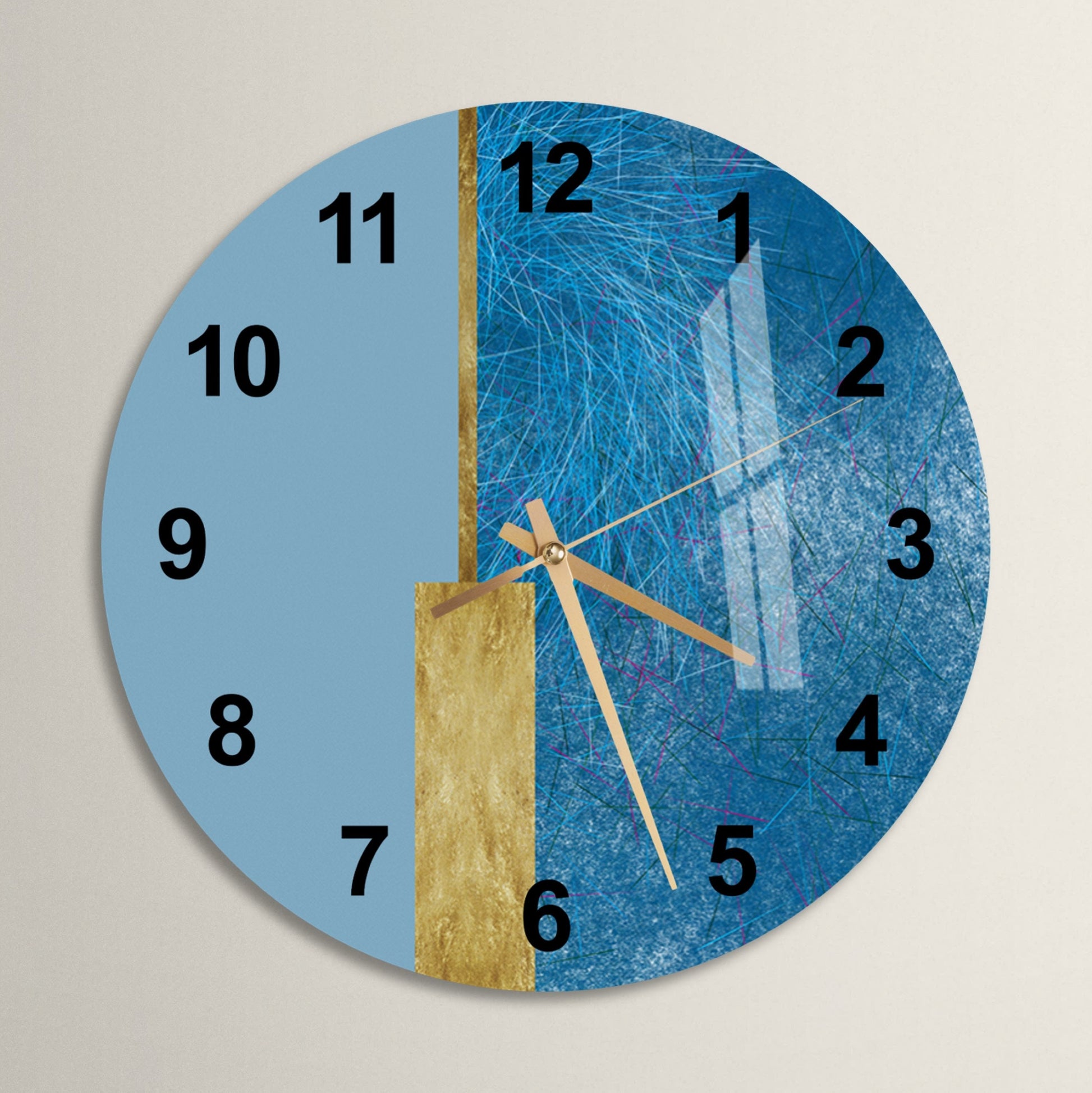 a blue and gold clock with numbers on it
