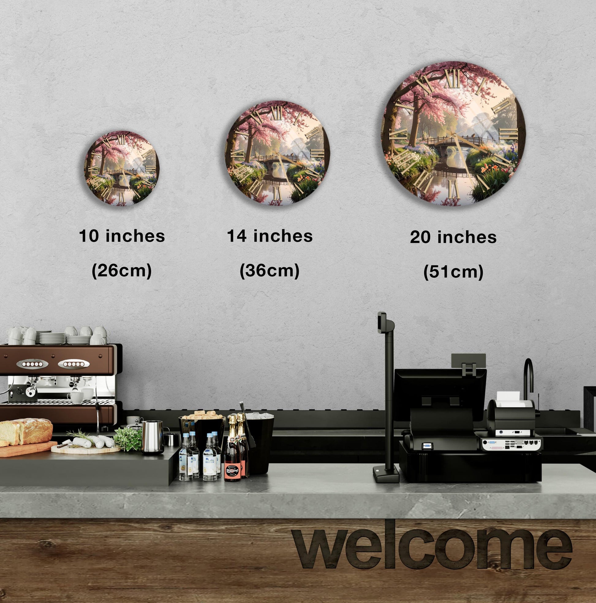 a counter with a cash register, a coffee machine, and various food and drink items displayed on it. Above the counter, there are three circular images of different sizes, each depicting a different scene. The largest image is a 20-inch circle, the medium-sized one is 14 inches, and the smallest is 10 inches. The counter also has a "welcome" sign, and there are bottles and a cup visible on the counter.