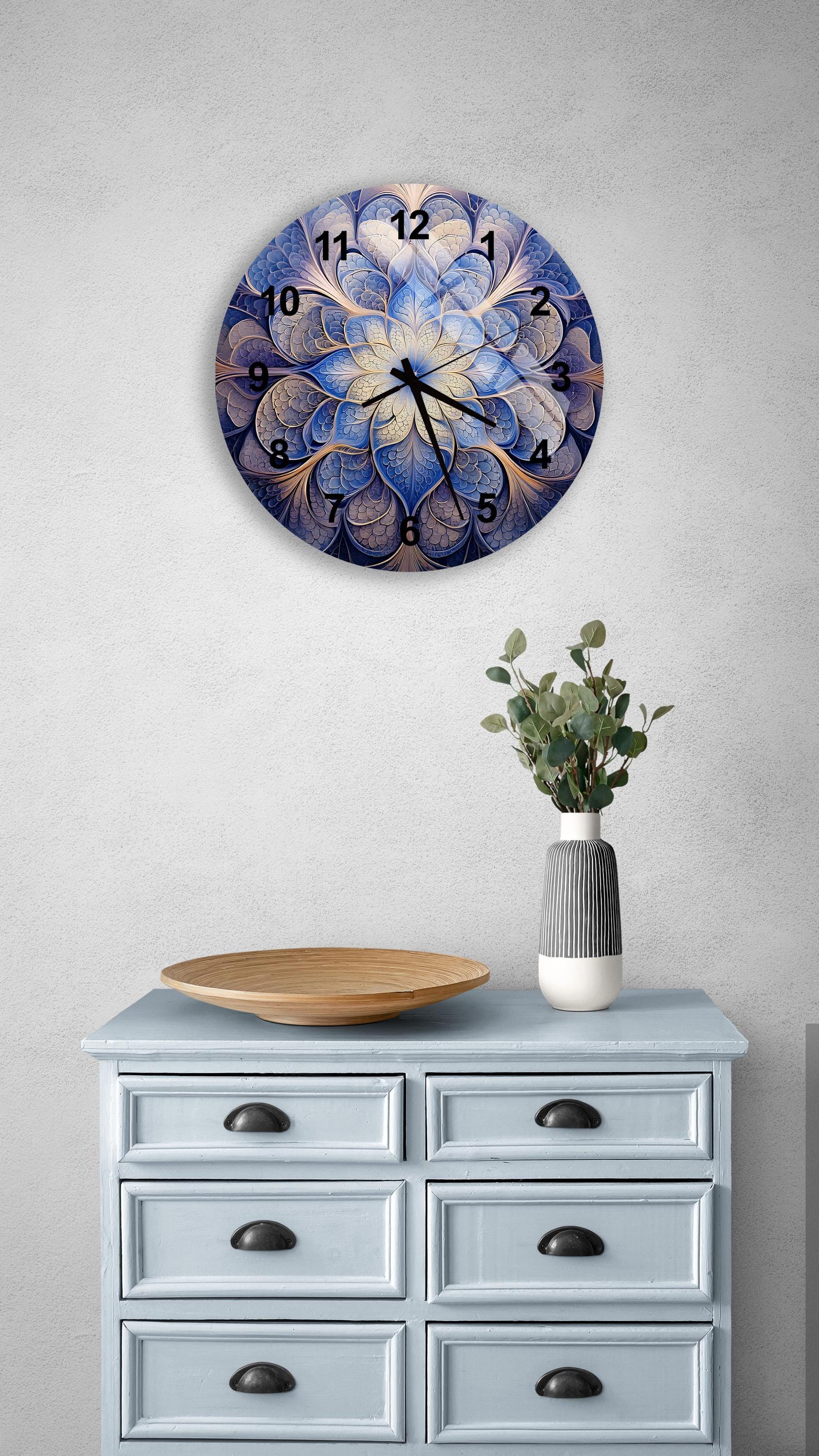 a clock on a wall above a dresser