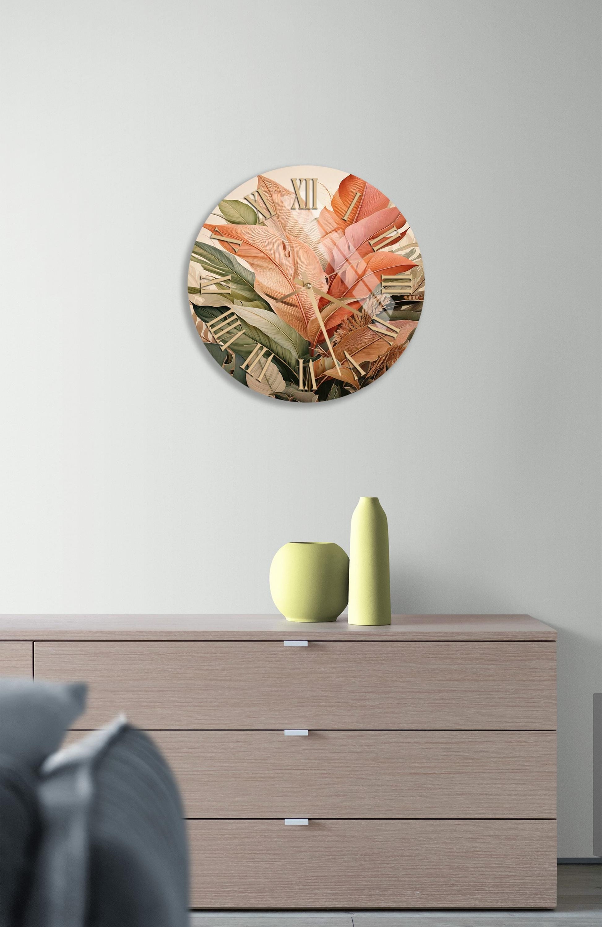 a clock on a wall above a dresser