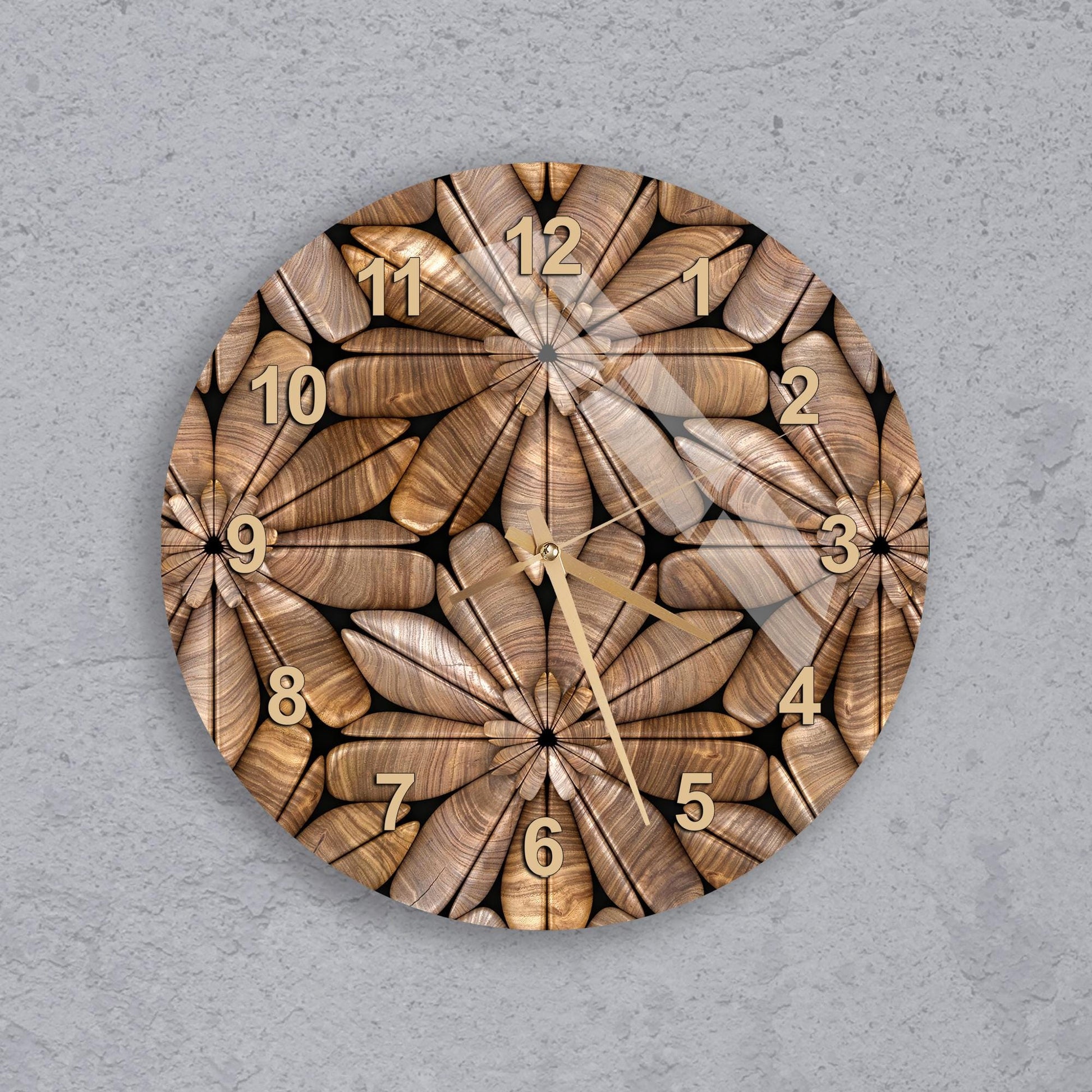A wall clock with a wooden design featuring a repeating pattern of brown and gold elements.