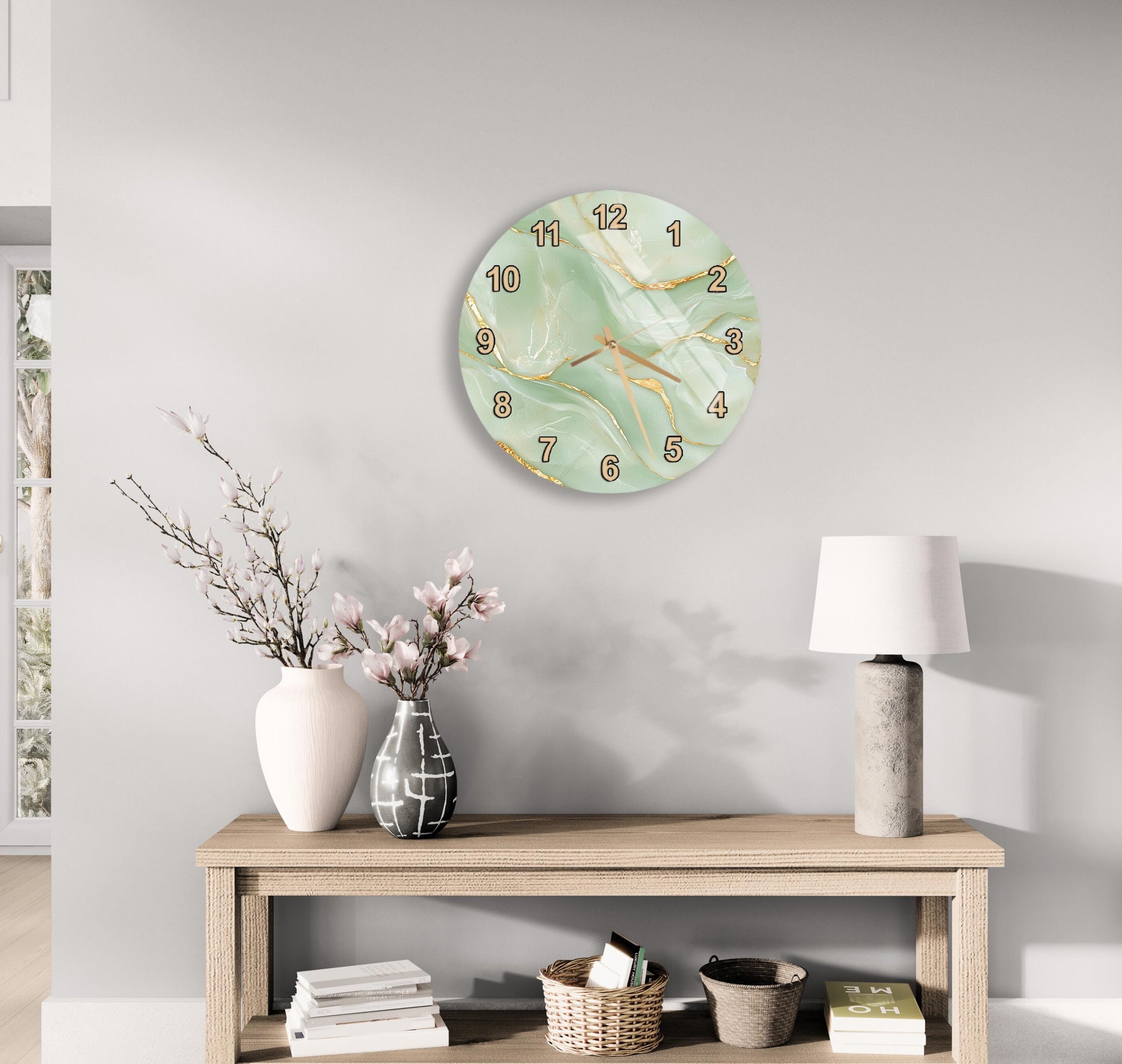 a modern living room with a round wall clock displaying the time as 12:30, a wooden table with a lamp, a vase with flowers, and a stack of books.