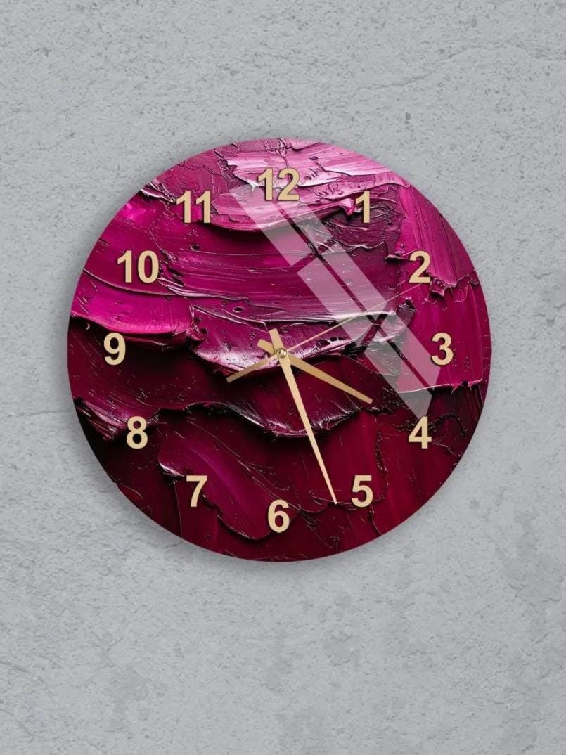 six circular wall clocks with a pink and purple color scheme, each displaying a different time.