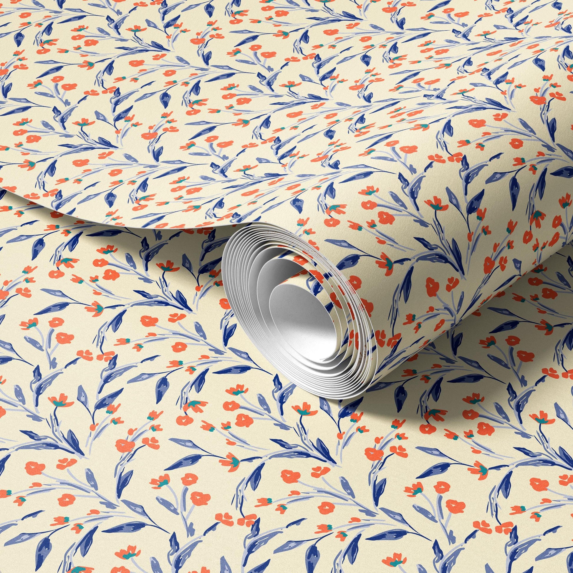 a roll of wallpaper with a floral pattern in shades of blue and orange.