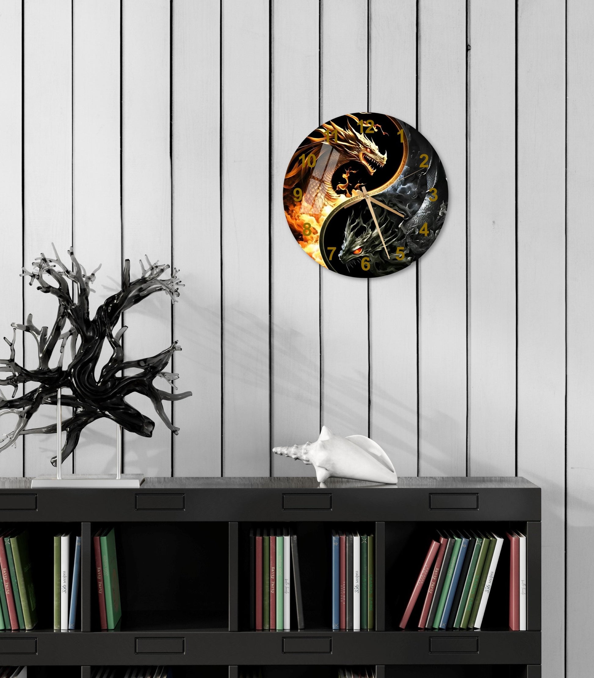 a black and gold clock on a white wall