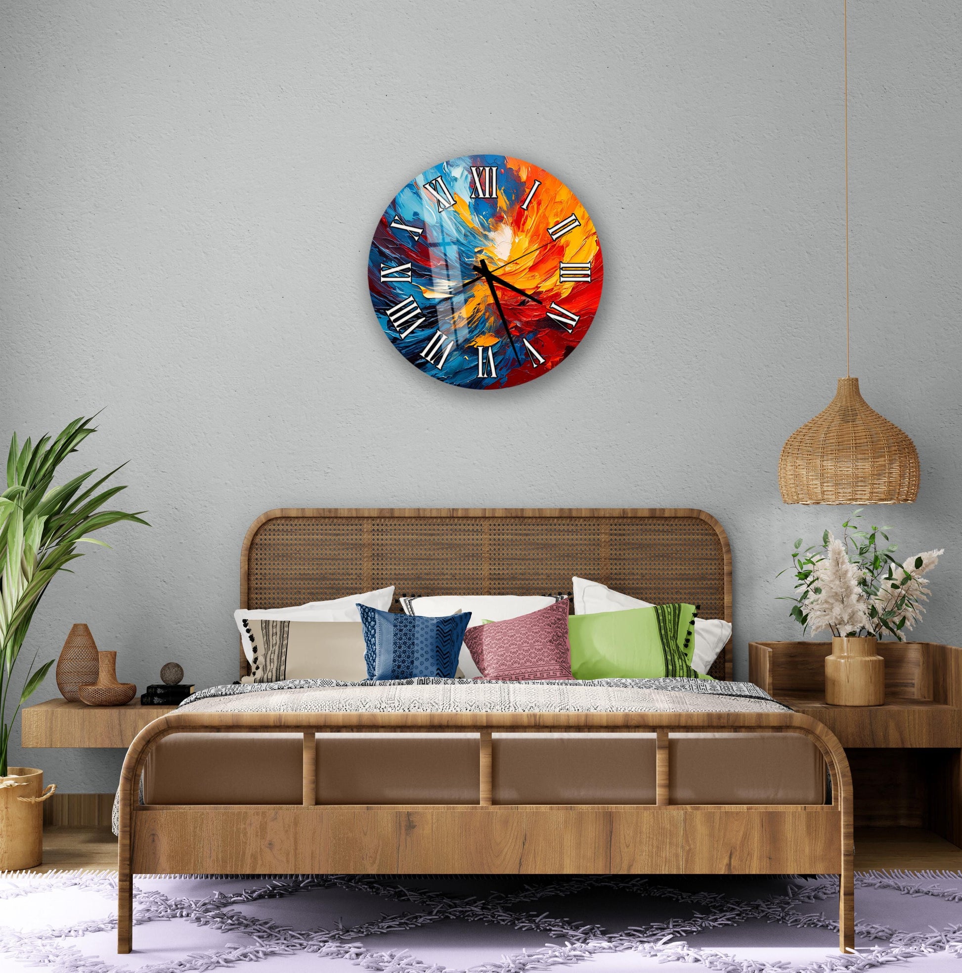 a bedroom with a large, colorful, abstract wall clock hanging above a bed with a wooden headboard. The room has a neutral color scheme with a few decorative elements, such as potted plants and vases.