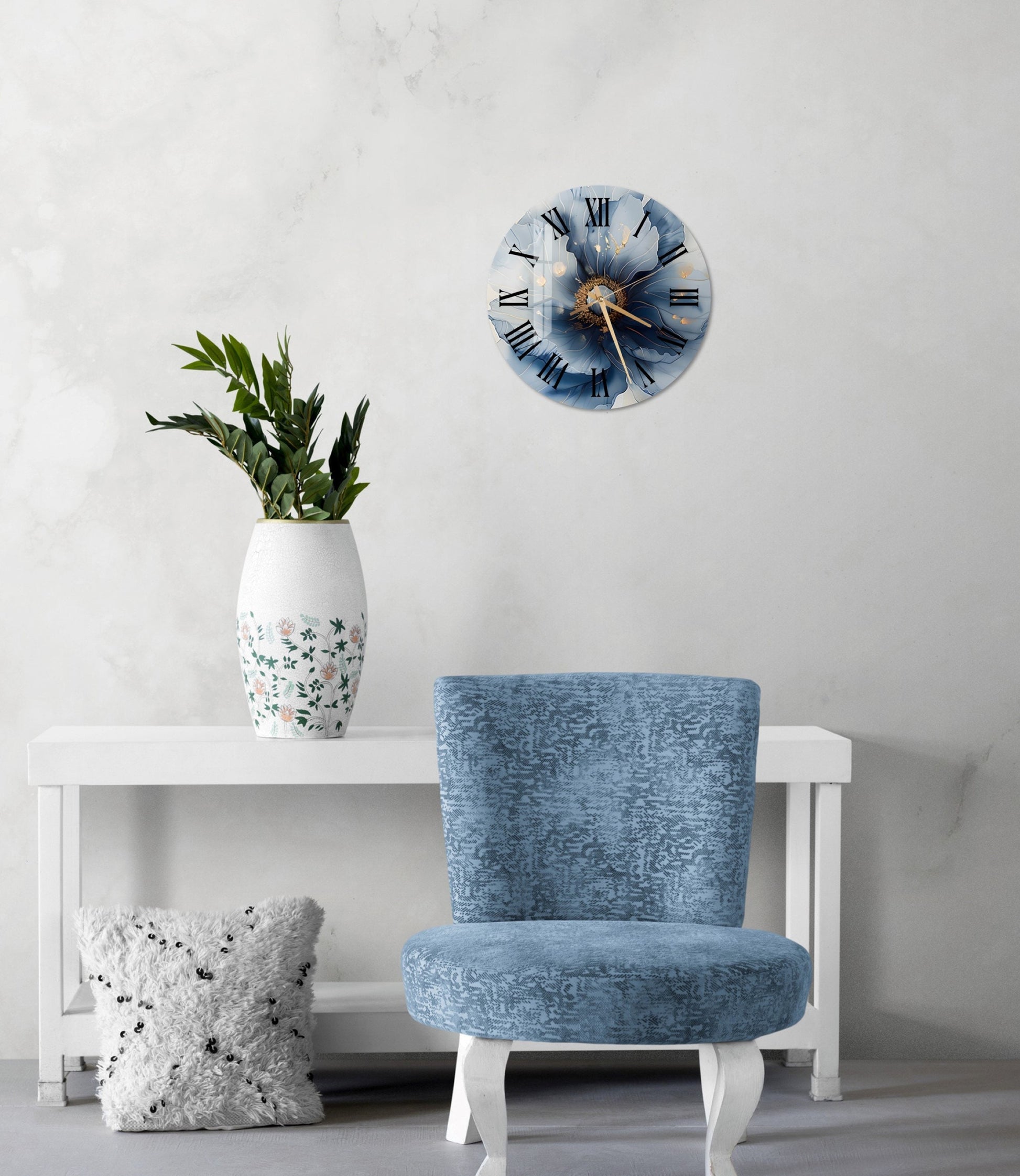 a blue chair sitting next to a white table
