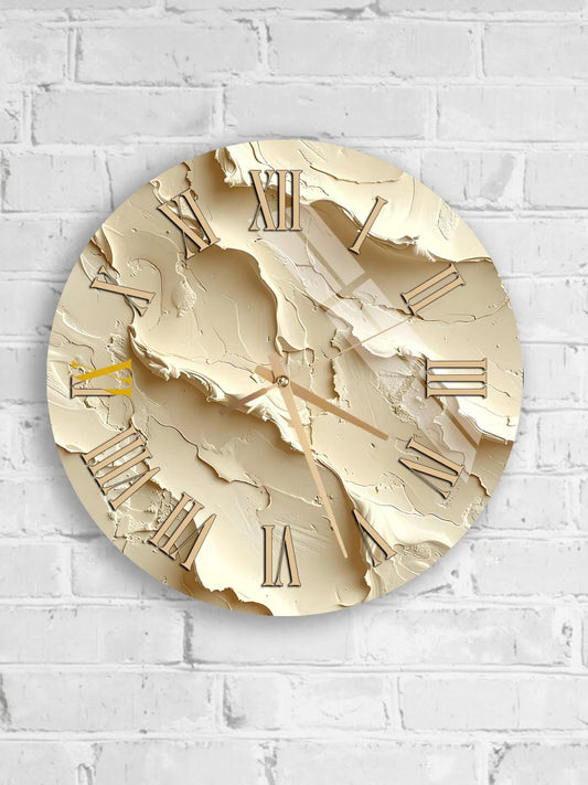 A round wall clock with Roman numerals on a white brick wall.
