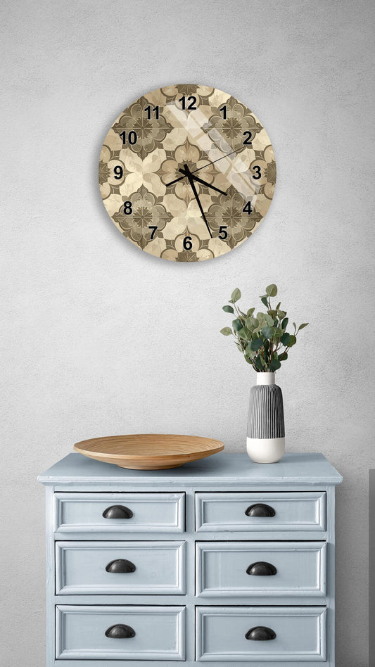 a wall clock with a floral pattern, a wooden bowl, and a vase with greenery on a light blue dresser.
