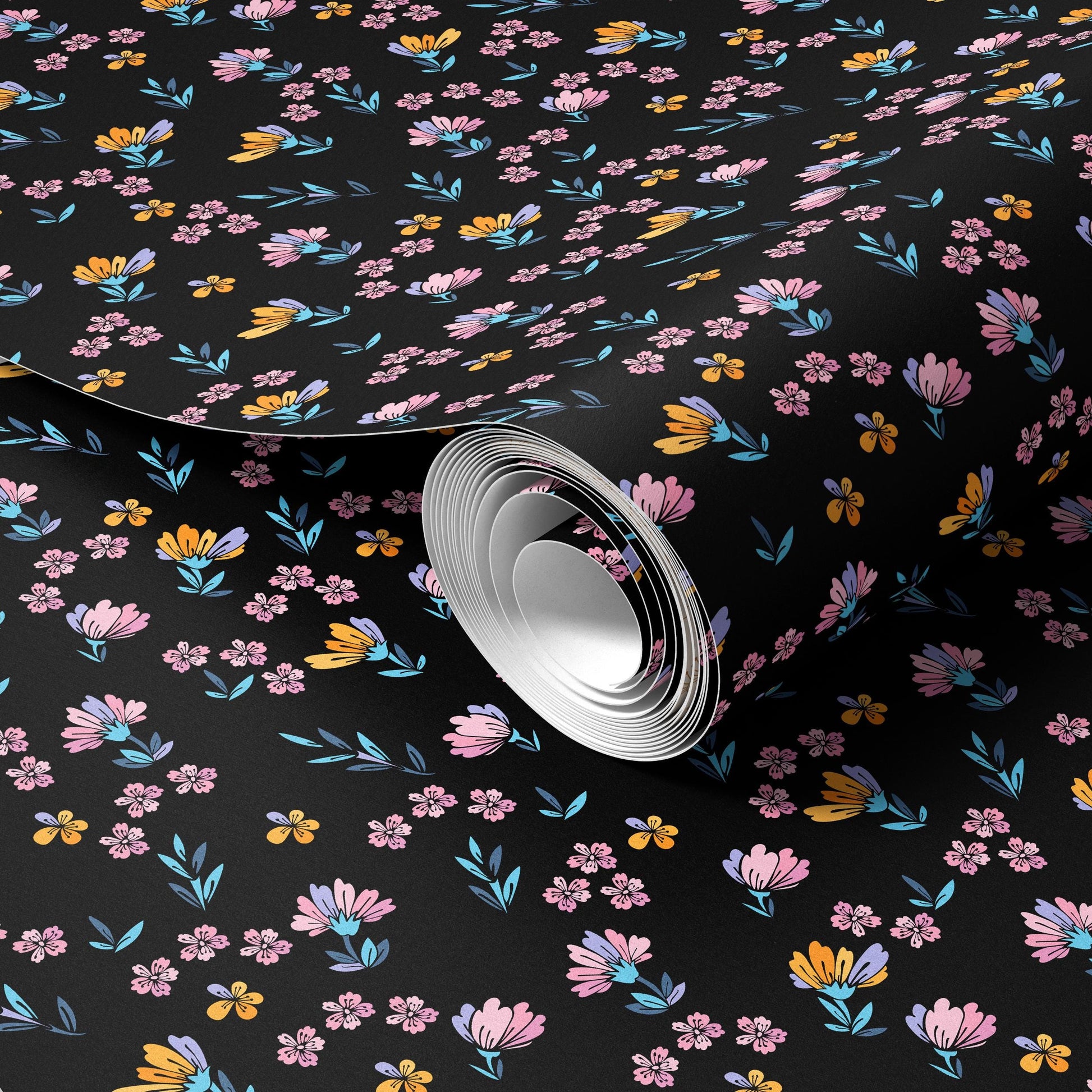 a roll of wallpaper with a floral pattern on it, including various shades of pink, orange, and yellow flowers against a black background.