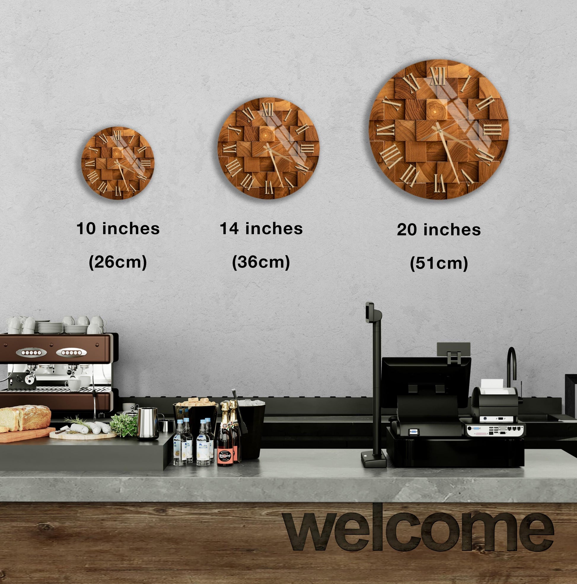 a wooden clock with Roman numerals on a wall, accompanied by three different sizes of the same clock. Below the clock, there is a counter with various items such as bottles and a sandwich. The word "welcome" is displayed on the counter.