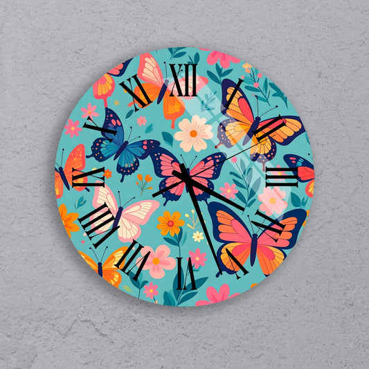 A round wall clock with a vibrant floral and butterfly design.